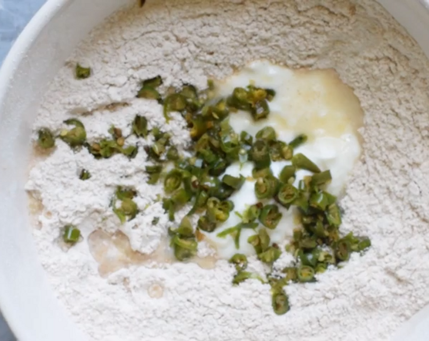 step 2 To that add, Yogurt (1 cup), Ginger Paste (1 Tbsp), Jalapeño Pepper (1), Fresh Cilantro (4 Tbsp), and Onion (1/2).