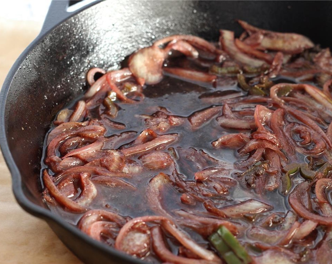 step 9 Then add Cabernet Sauvignon (1 cup), and reduce by one half.