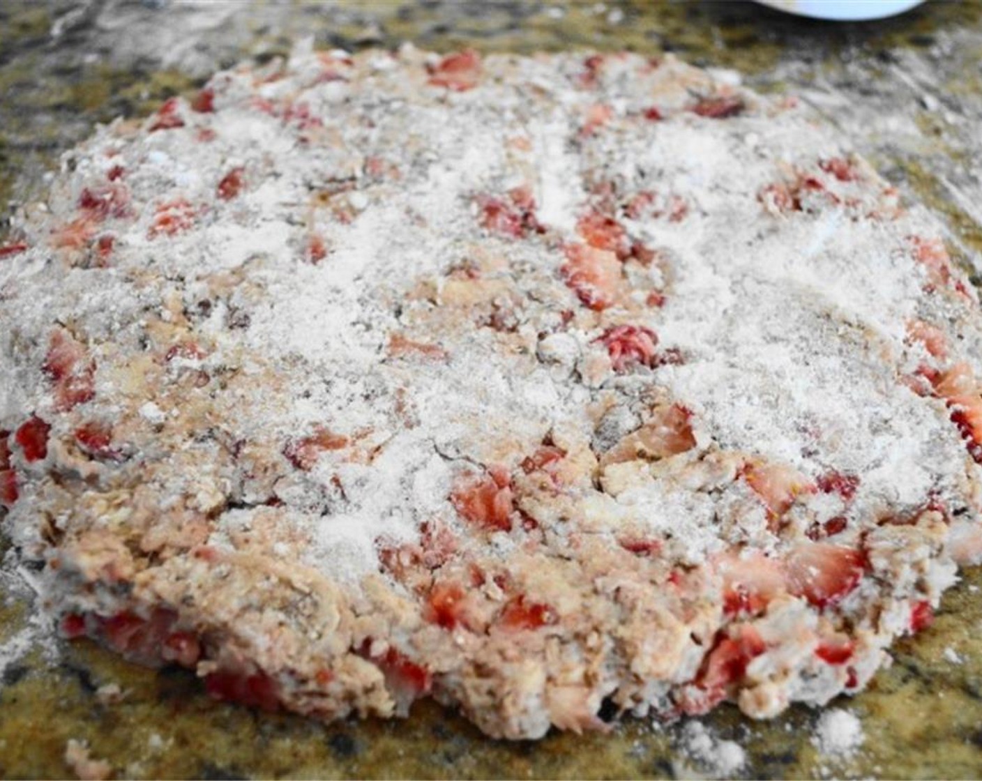 step 4 Dust your clean hands with a little extra flour and bring it together into a ball, then flatten it out into an even disc about 6 inches in diameter on a well floured surface. Sprinkle the top with flour as well.