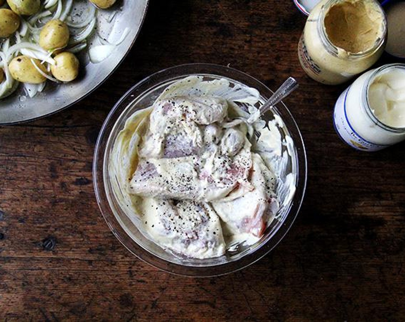 step 3 In a medium bowl, stir together the Mayonnaise (1/4 cup) and the Dijon Mustard (2 Tbsp). Add the Bone-in, Skin-on Chicken Thighs (4) and toss to coat on all sides.