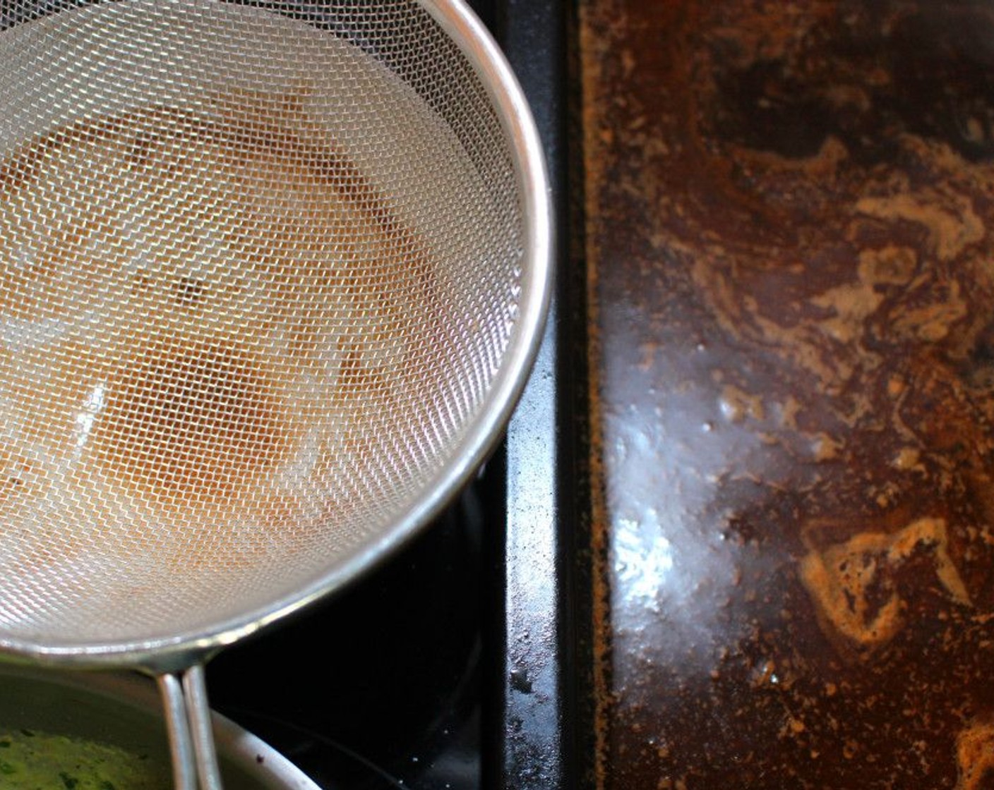step 8 Strain the sauce, check and adjust the seasonings.
