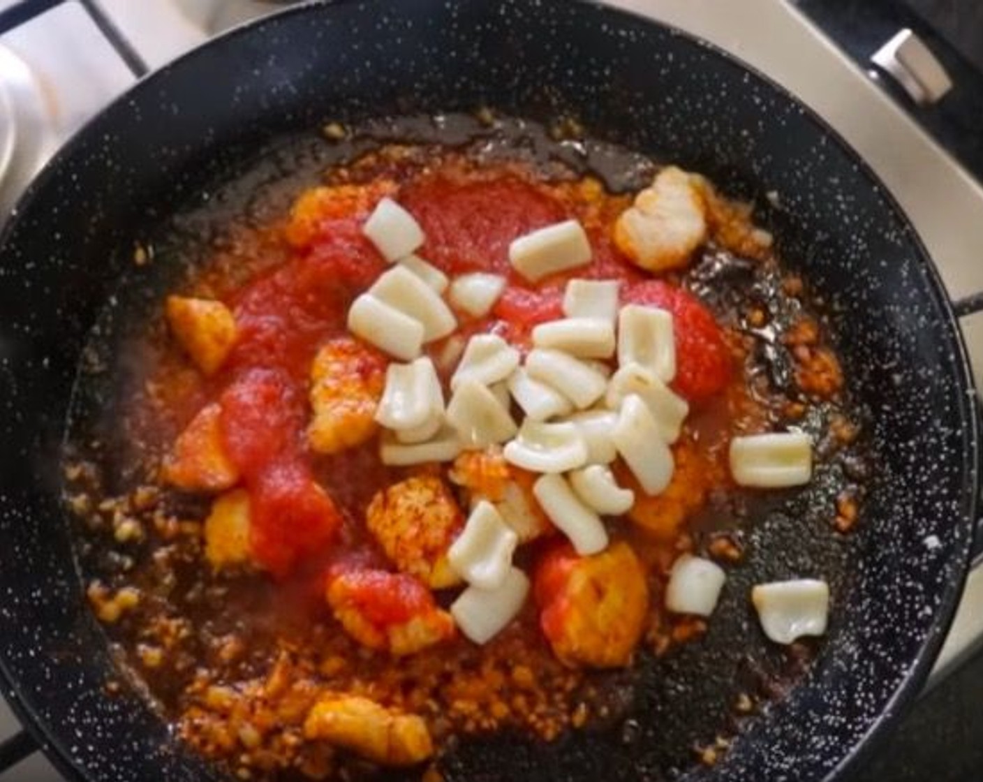 step 11 Pinch in Saffron Threads (1/2 tsp), then add the squid back into the pan and mix it all together.