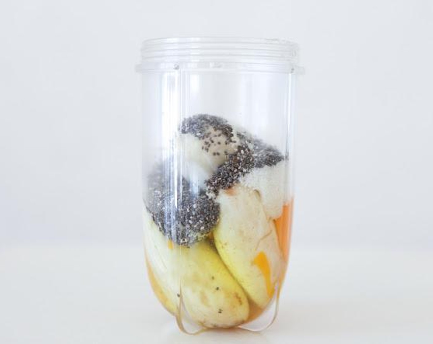 step 2 Place Sugar Bananas (4), Eggland's Best Classic Eggs (3), Unsweetened Shredded Coconut (3 Tbsp), Chia Seeds (1 Tbsp), and Simply Organic Cinnamon, Ground (1/2 tsp) in magic bullet or blender.