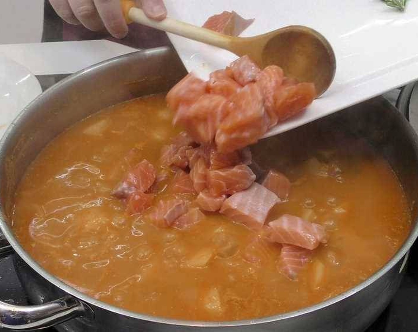 step 5 About 10 minutes before the potatoes are fully cooked, add the Salmon (14 oz) chunks. Once everything is fully cooked turn off the heat and let the stew rest for 10 minutes.