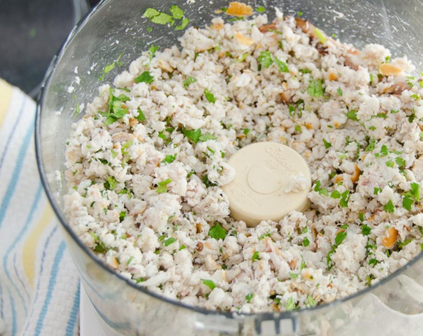 step 8 Add the Mayonnaise (1 cup), chopped cilantro, zest of the Lemon (1), juice of half the lemon, finely diced jalapenos, Salt (1/2 tsp) and Ground White Pepper (1/2 tsp).