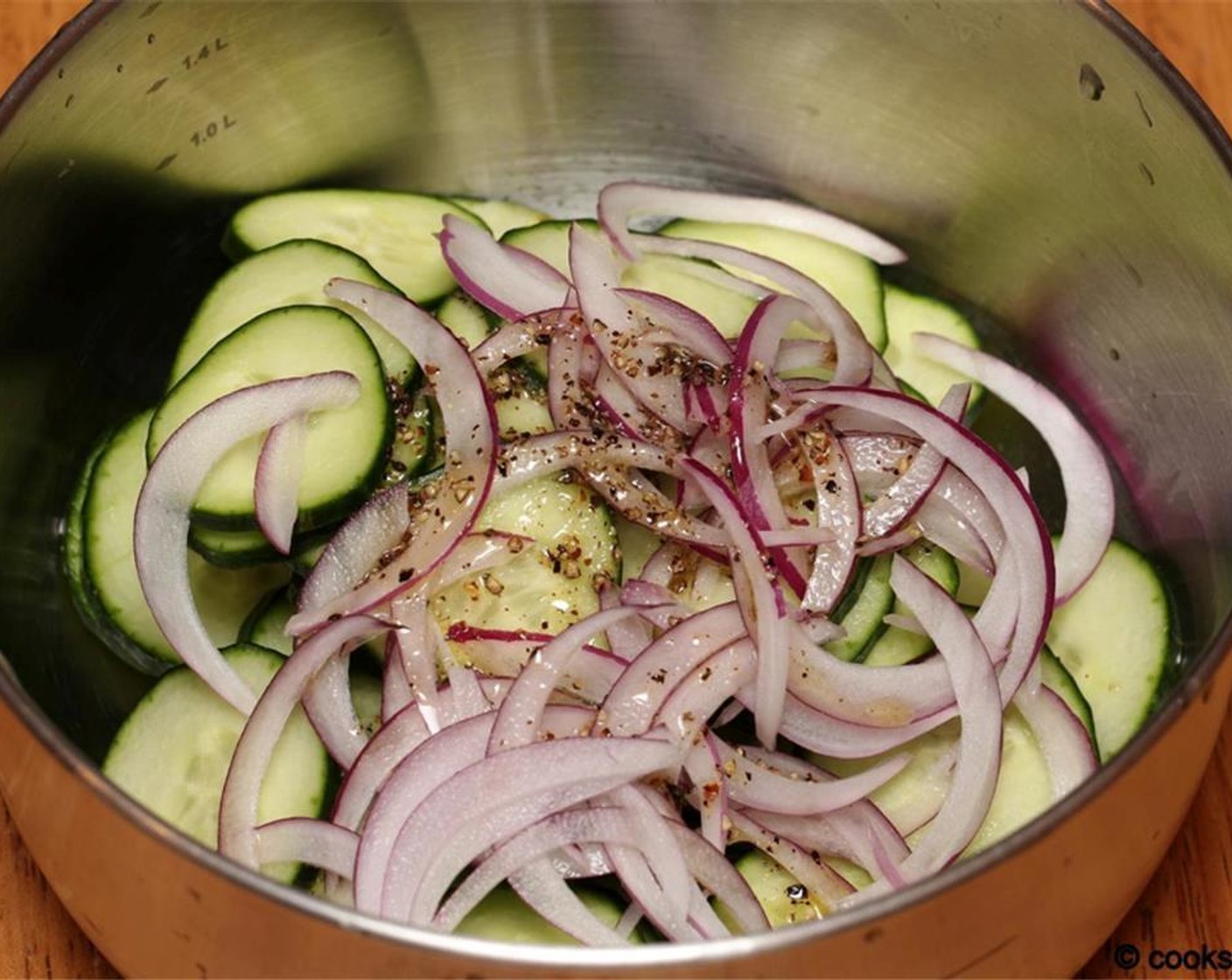 step 2 Toss with the Onion (1/2 cup) and Cucumbers (2 cups).