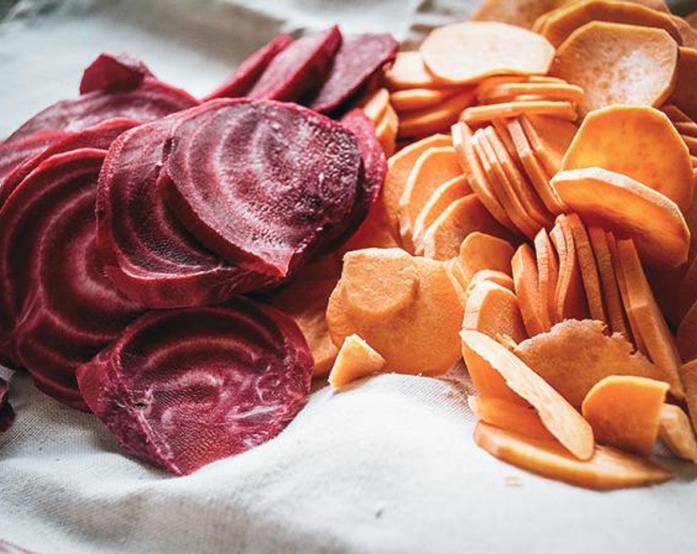 step 6 While the dough refrigerates, peel and thinly slice Sweet Potatoes (2) and Beet (1). Then slice Onion (1/4 cup) and set aside.