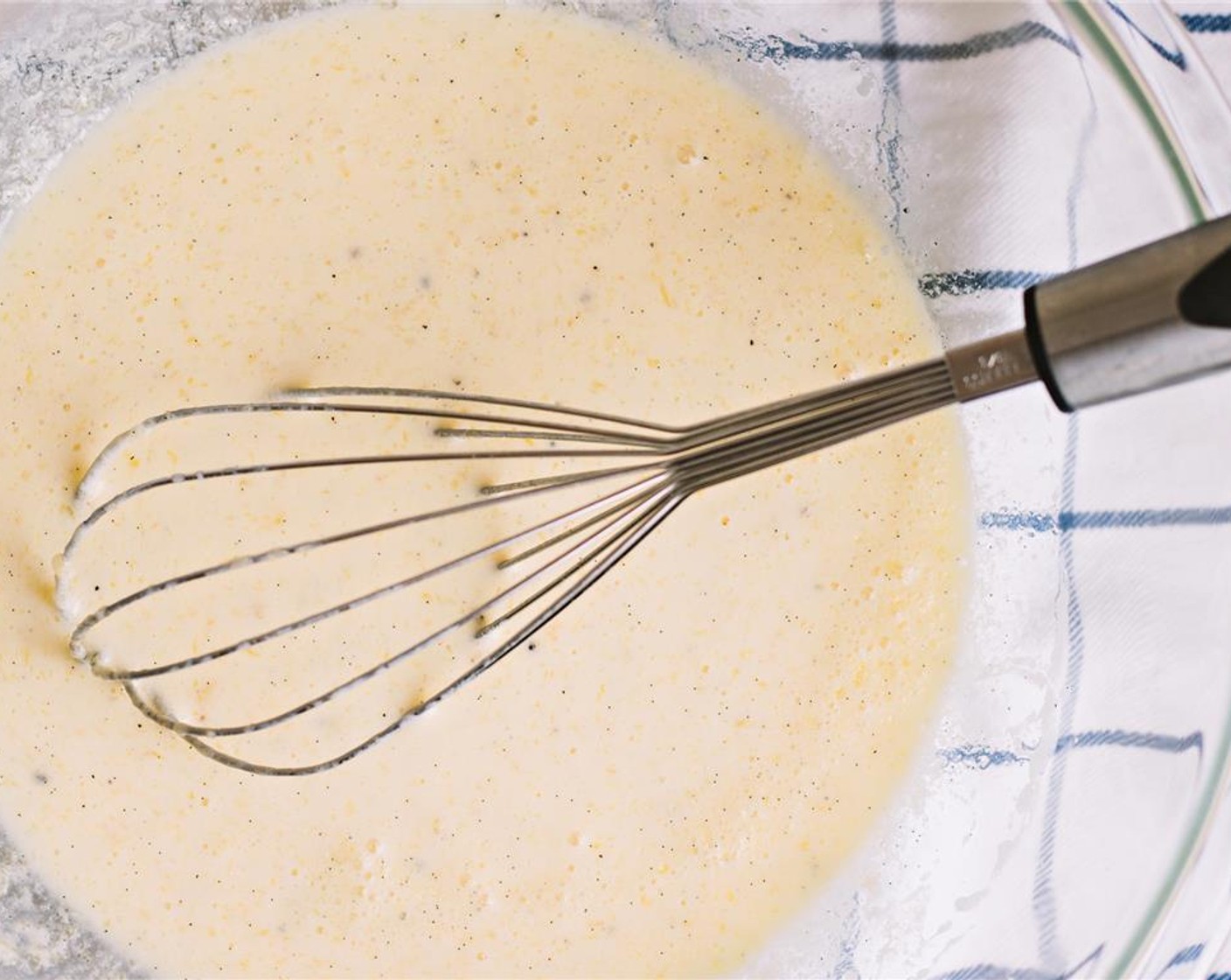 step 5 In a separate bowl, thoroughly whisk the butter, Buttermilk (1 1/2 cups), Farmhouse Eggs® Large Brown Eggs (2) and vanilla bean.