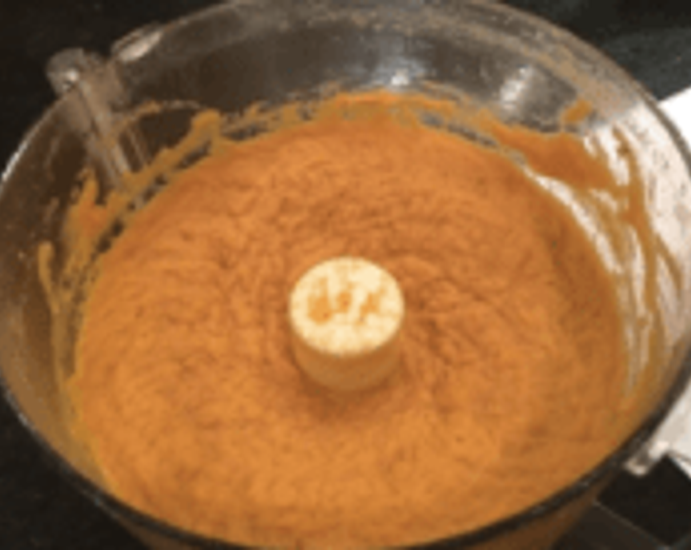 step 3 Add potatoes to food processor with Dark Brown Sugar (4 Tbsp), Unsalted Butter (4 Tbsp), Bourbon (2 Tbsp), Salt (1/2 tsp), Fresh Ginger (1/2 tsp), Ground Allspice (1/8 tsp), Ground Nutmeg (1/8 tsp), Simply Organic Cinnamon, Ground (1/2 tsp), Freshly Ground Black Pepper (1/8 tsp), zest and juice from Orange (1), Vanilla Extract (1 tsp), Farmhouse Eggs® Large Brown Eggs (2) and Pineapple (2/3 cup).