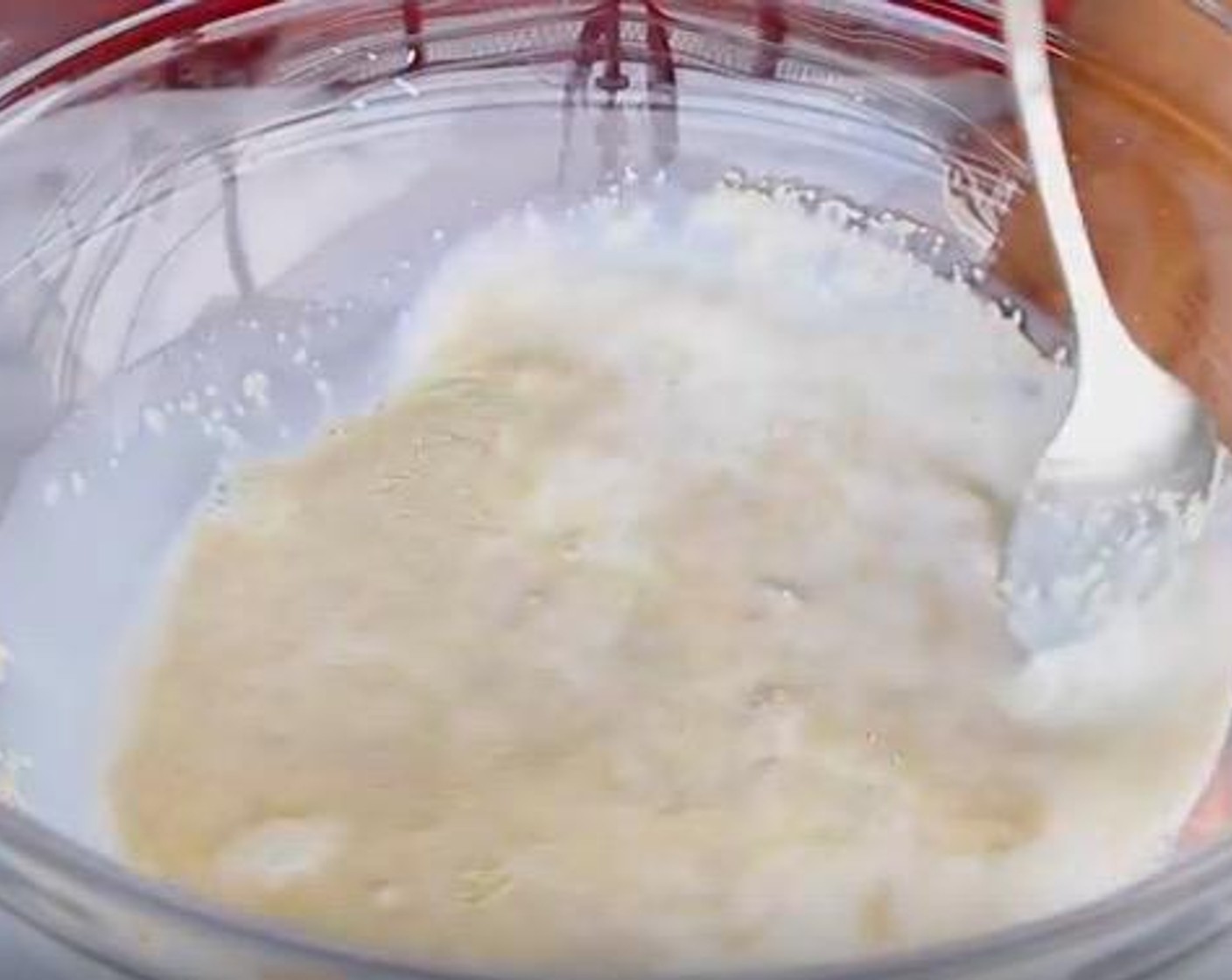 step 1 In a mixing bowl, add Milk (1 1/4 cups), heated to about 120 degrees F (50 degrees C). Sprinkle in Active Dry Yeast (2 tsp) and mix lightly with a spoon. Let sit for 5-10 minutes, or until foamy.