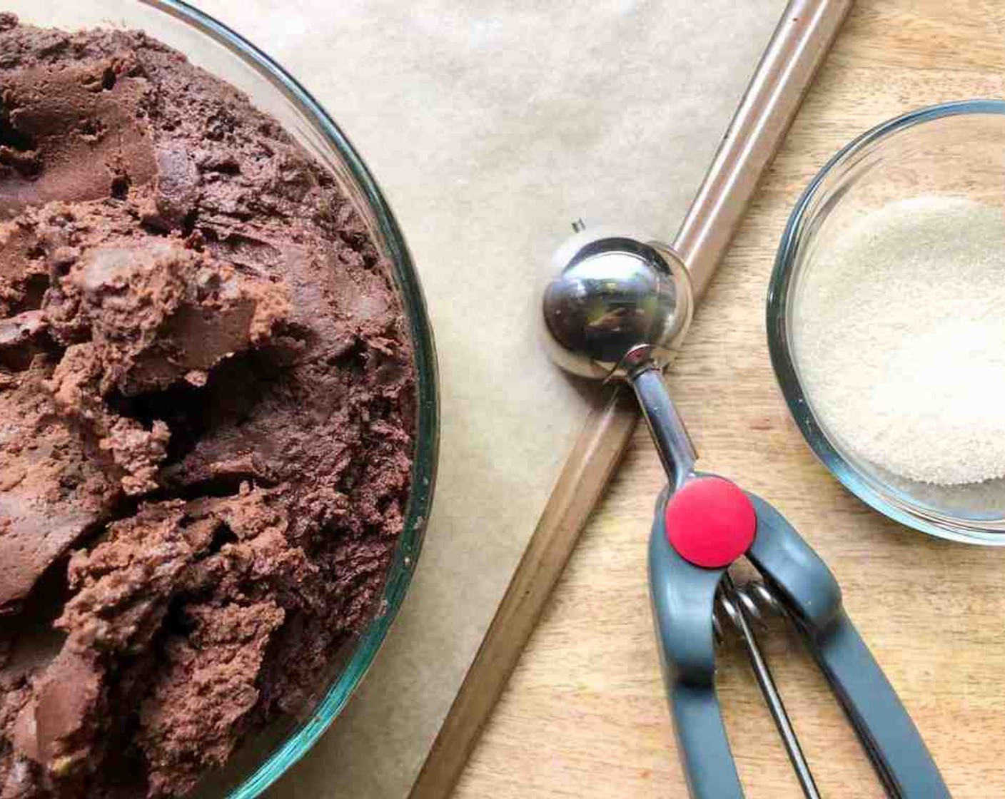 step 6 Shape the dough into 1-1/4-inch balls with a small ice-cream scoop or two tablespoons. A 1 1/2 Tbsp capacity cookie scoop works well here.