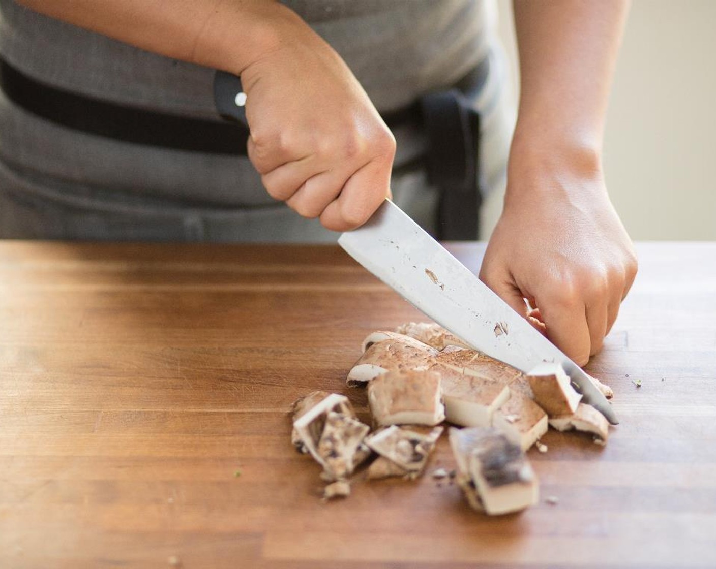 step 4 Using a spoon remove the gills from the Portobello Mushrooms (1 1/3 cups) and discard. Slice the caps into 1/2 inch dice; set aside.