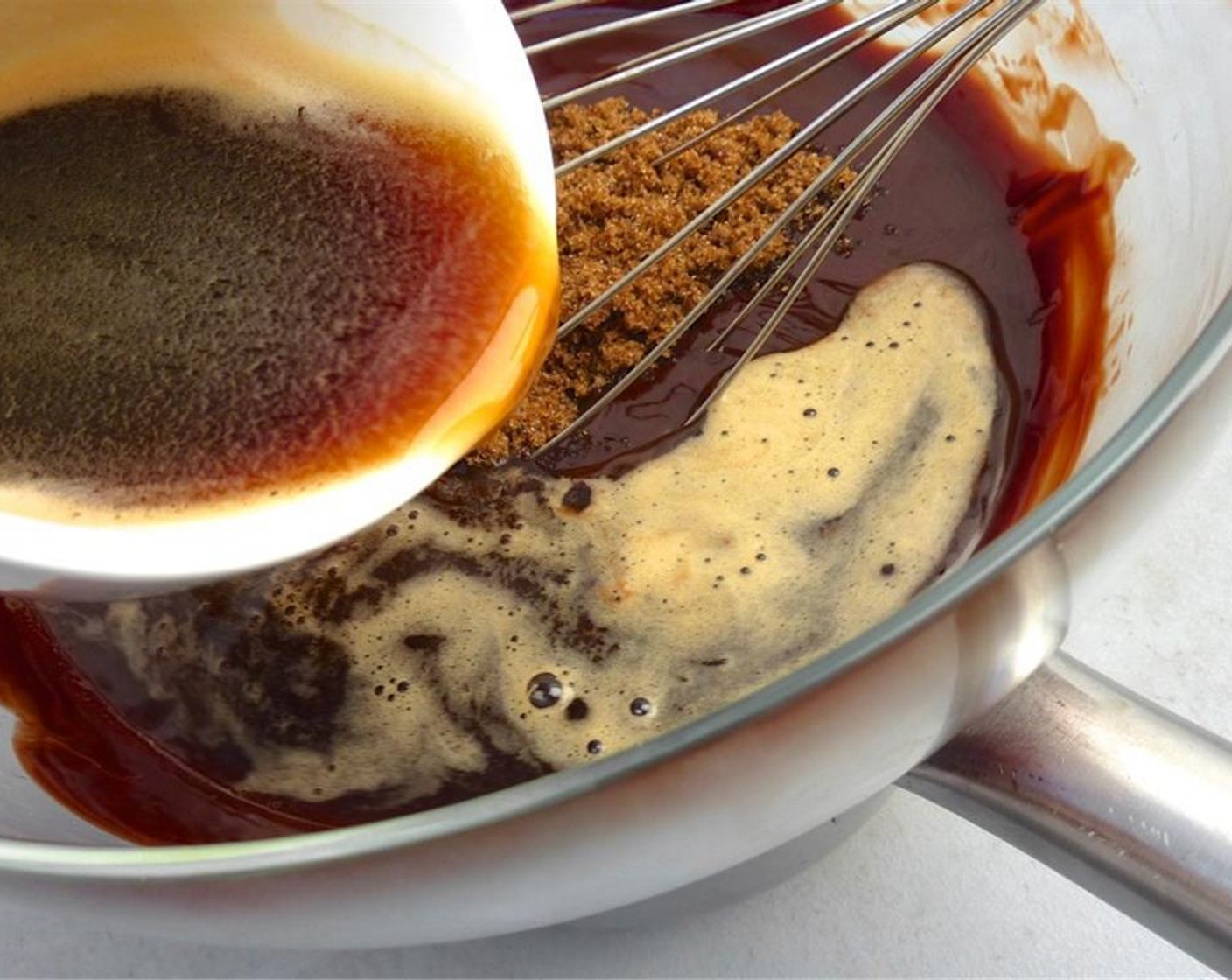 step 3 Stir well until you get a glossy chocolate mix. Pour in the strong Espresso (1/2 cup) and the Brown Sugar (1/2 cup).
