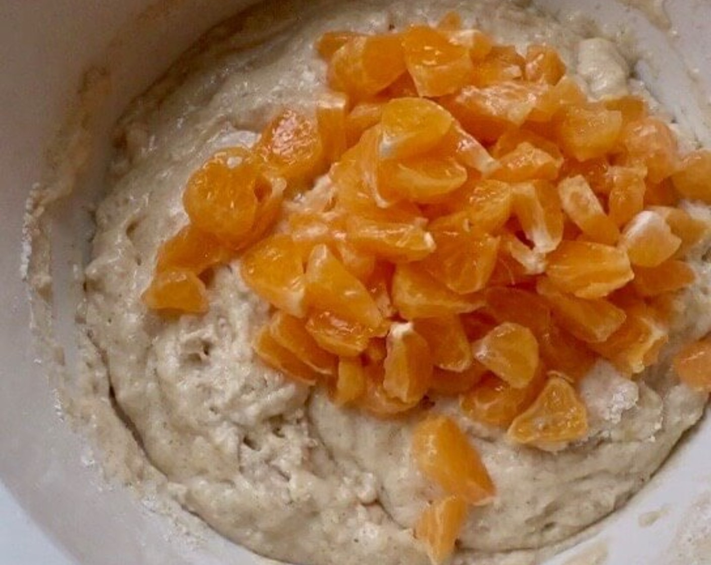 step 7 Next, fold in the diced mandarin oranges.