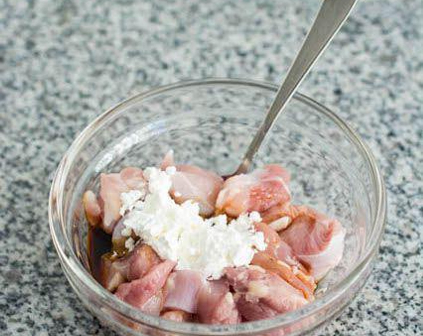 step 4 Marinate the chicken in Soy Sauce (1 Tbsp) and Corn Starch (1 tsp) for 15 minutes.