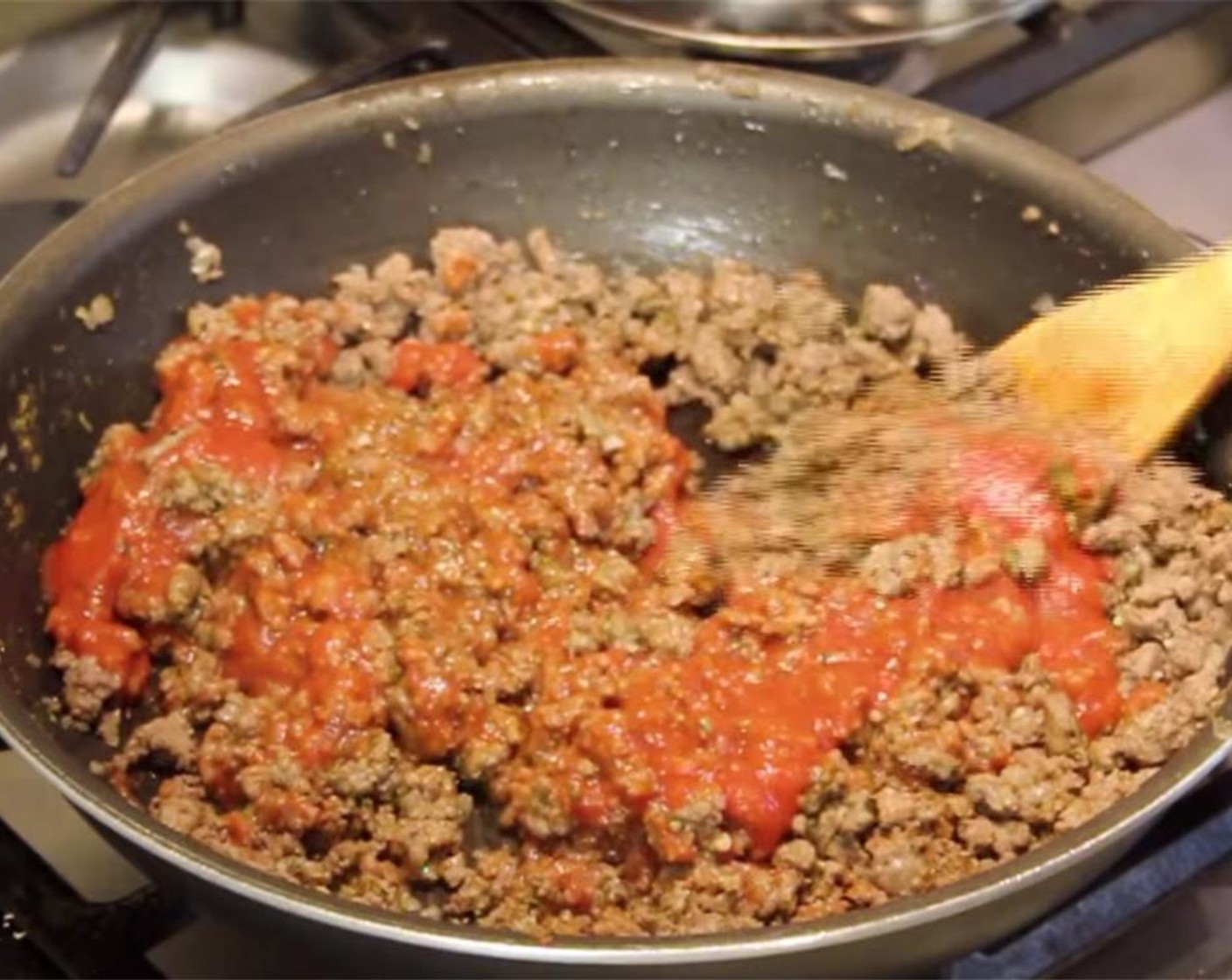 step 5 Add Ground Cumin (1/2 Tbsp), Tomato Sauce (1 cup), Water (1/2 cup) and Oregano Leaves (1 Tbsp). Lower heat to simmer for 10 minutes.