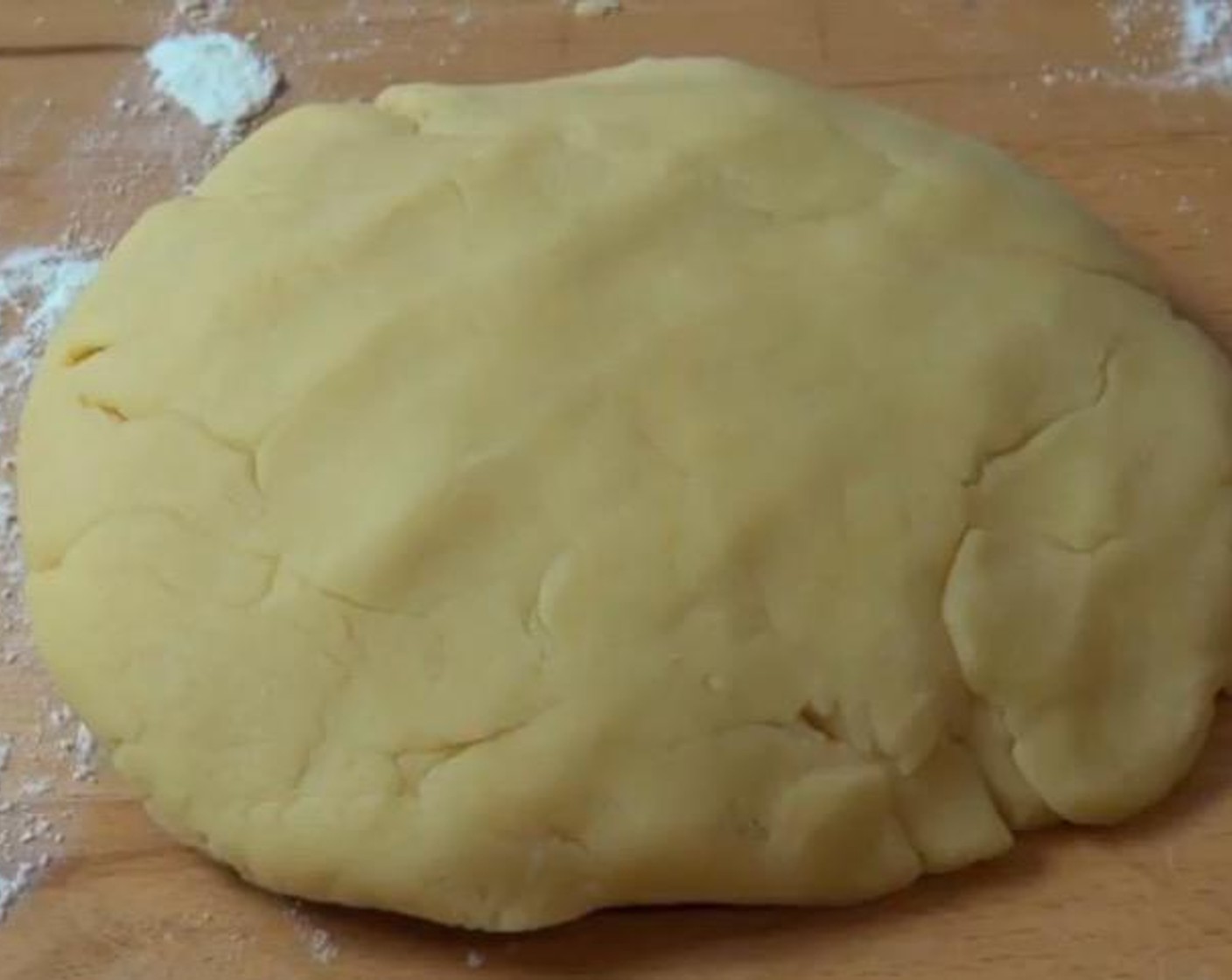 step 3 Lightly knead the dough on a floured surface until smooth. Form into a rough disk shape, cover with plastic wrap and chill in fridge for 1 hour.