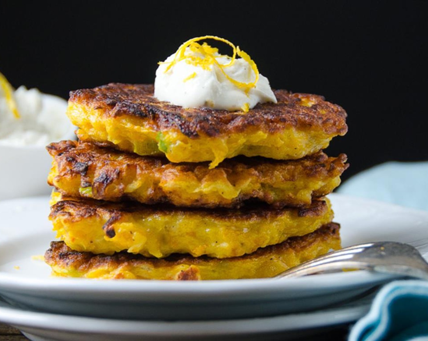 step 10 Serve fritters hot. Have your guests top the warm fritters with a spoonful of the lemon chèvre which gets delightfully gooey. Enjoy!