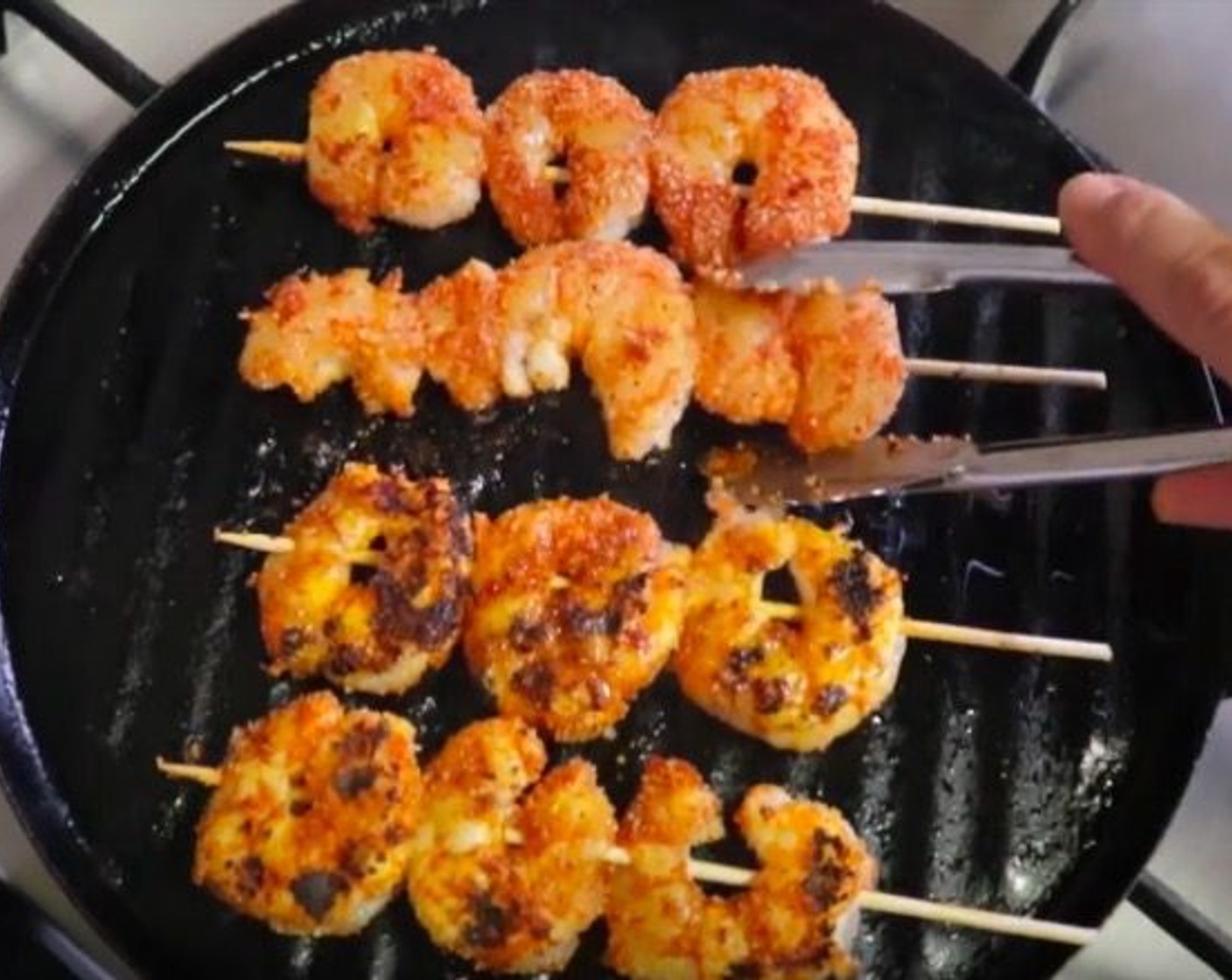 step 7 Once the pan gets hot, add the shrimp kabobs and cook for 2 minutes on each side. Once done, set the shrimp kabobs aside.