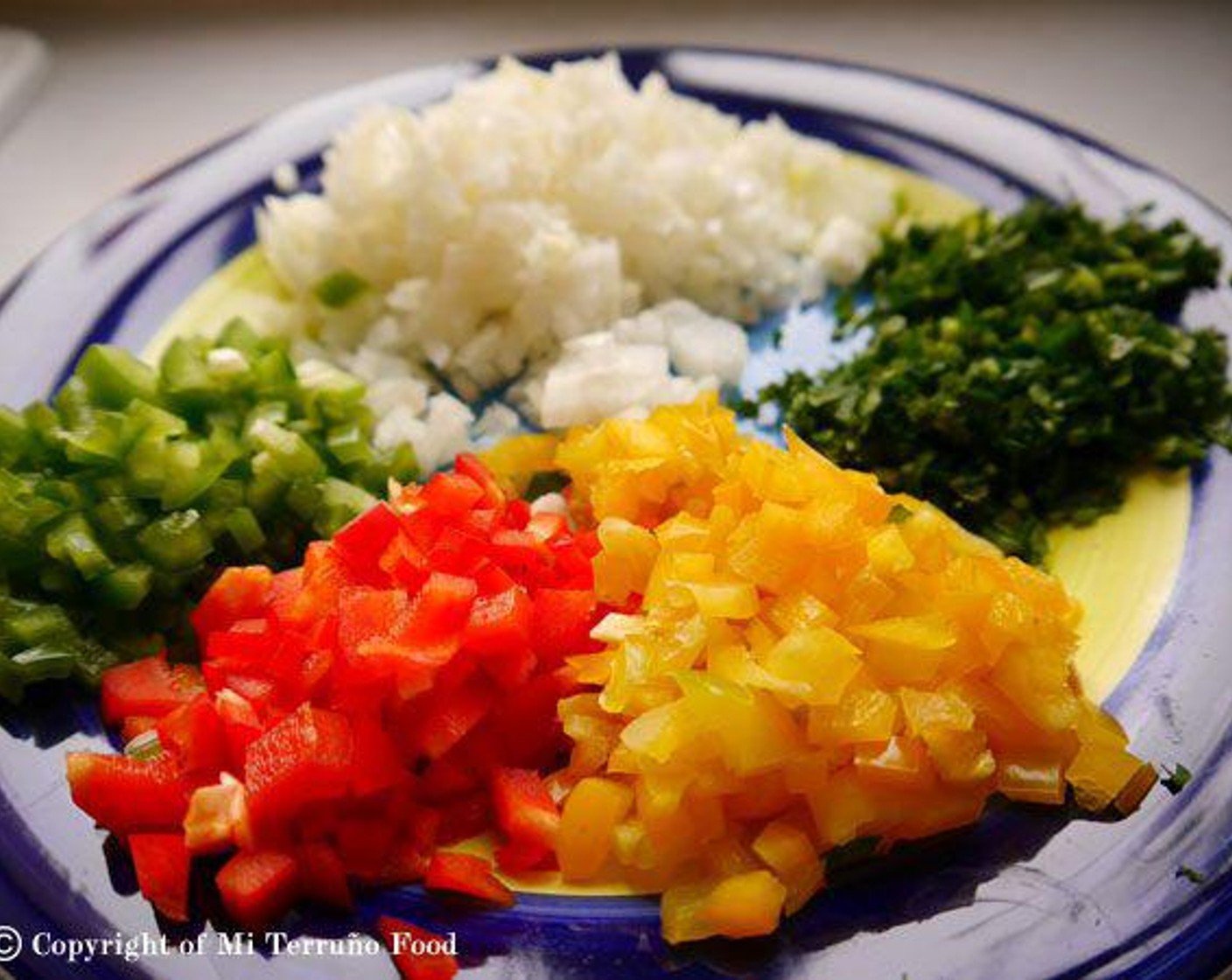 step 2 Cut the Red Potatoes (6 2/3 cups), Onion (1), Green Bell Pepper (1/2), Yellow Bell Pepper (1/2), and Red Bell Pepper (1/2) into small squares.