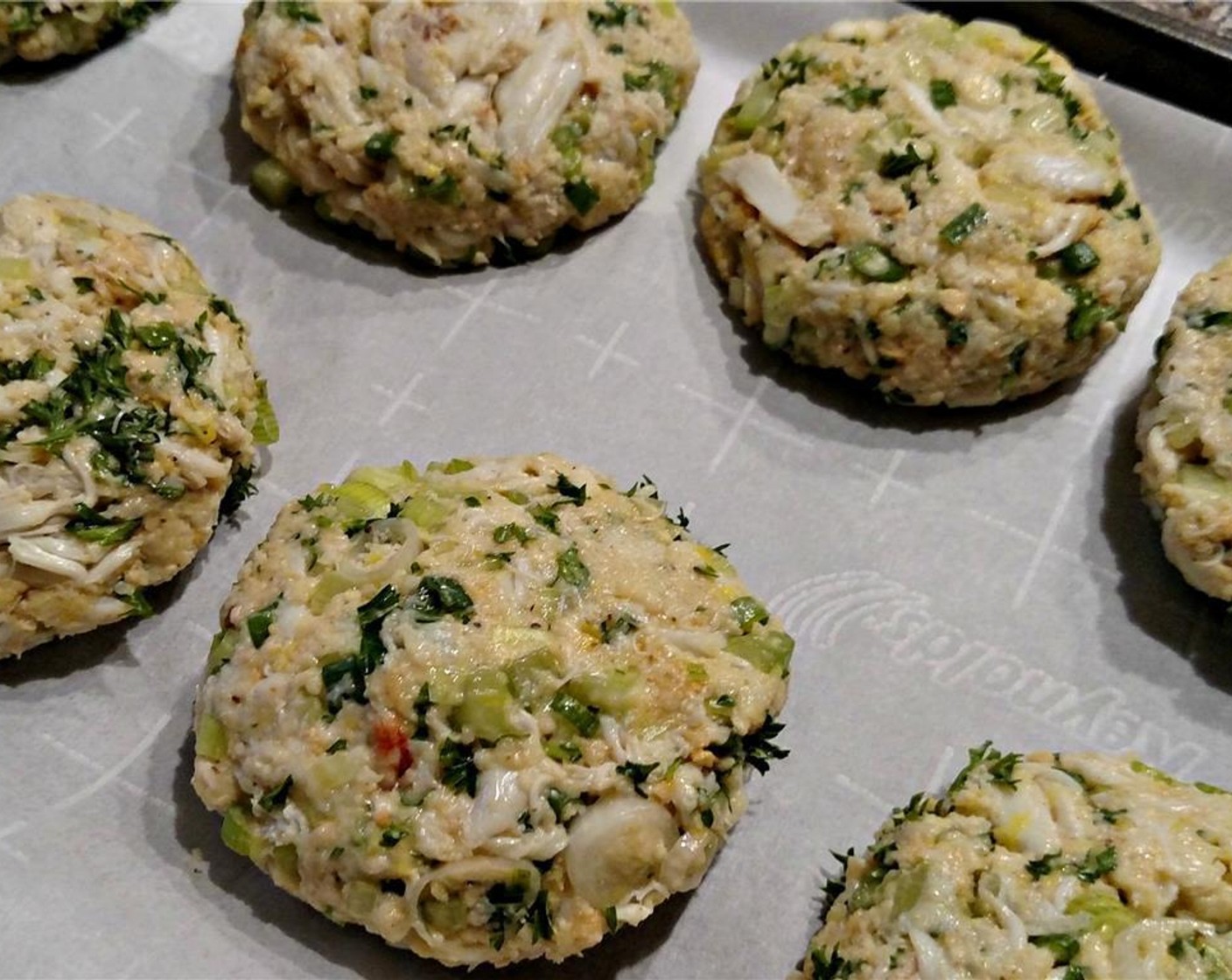 step 4 Place patties on parchment paper-lined baking sheet and refrigerate for 15 minutes.