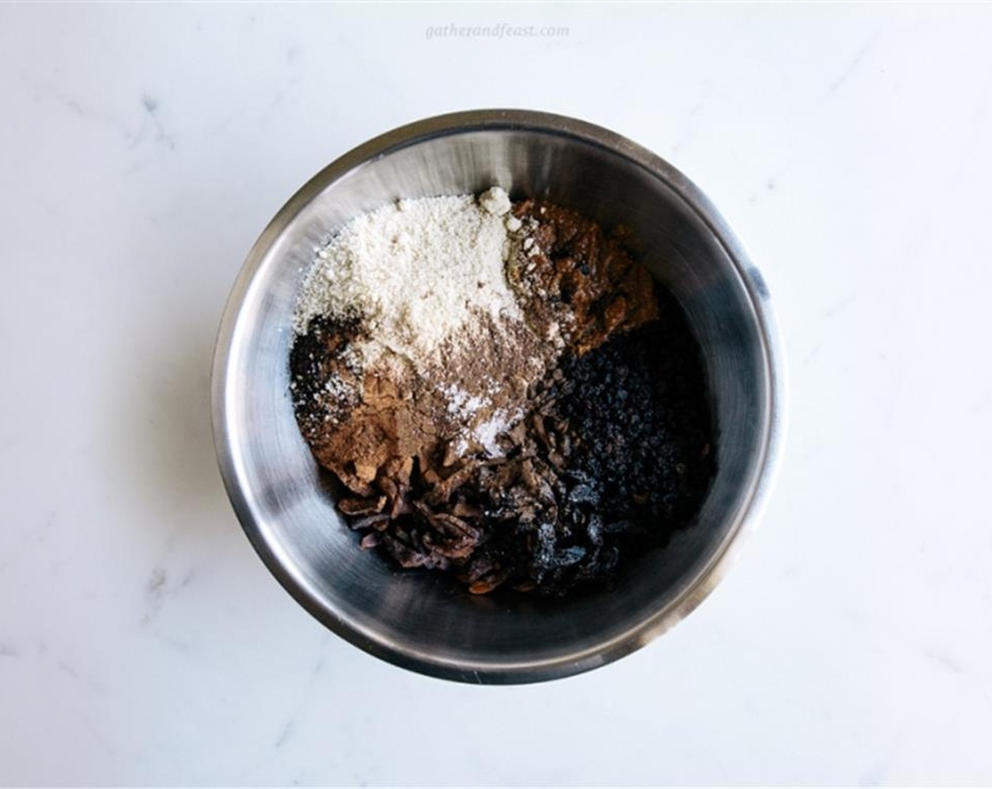 step 5 Transfer to a large bowl and add chopped apricots and prunes, Dried Currants (1 1/2 cups), Almond Meal (3 1/2 cups), Vanilla Bean Powder (1 tsp), Simply Organic Cinnamon, Ground (1 Tbsp), Ground Allspice (1 tsp), Whole Clove (1/4 tsp) and Ground Nutmeg (1/2 tsp).