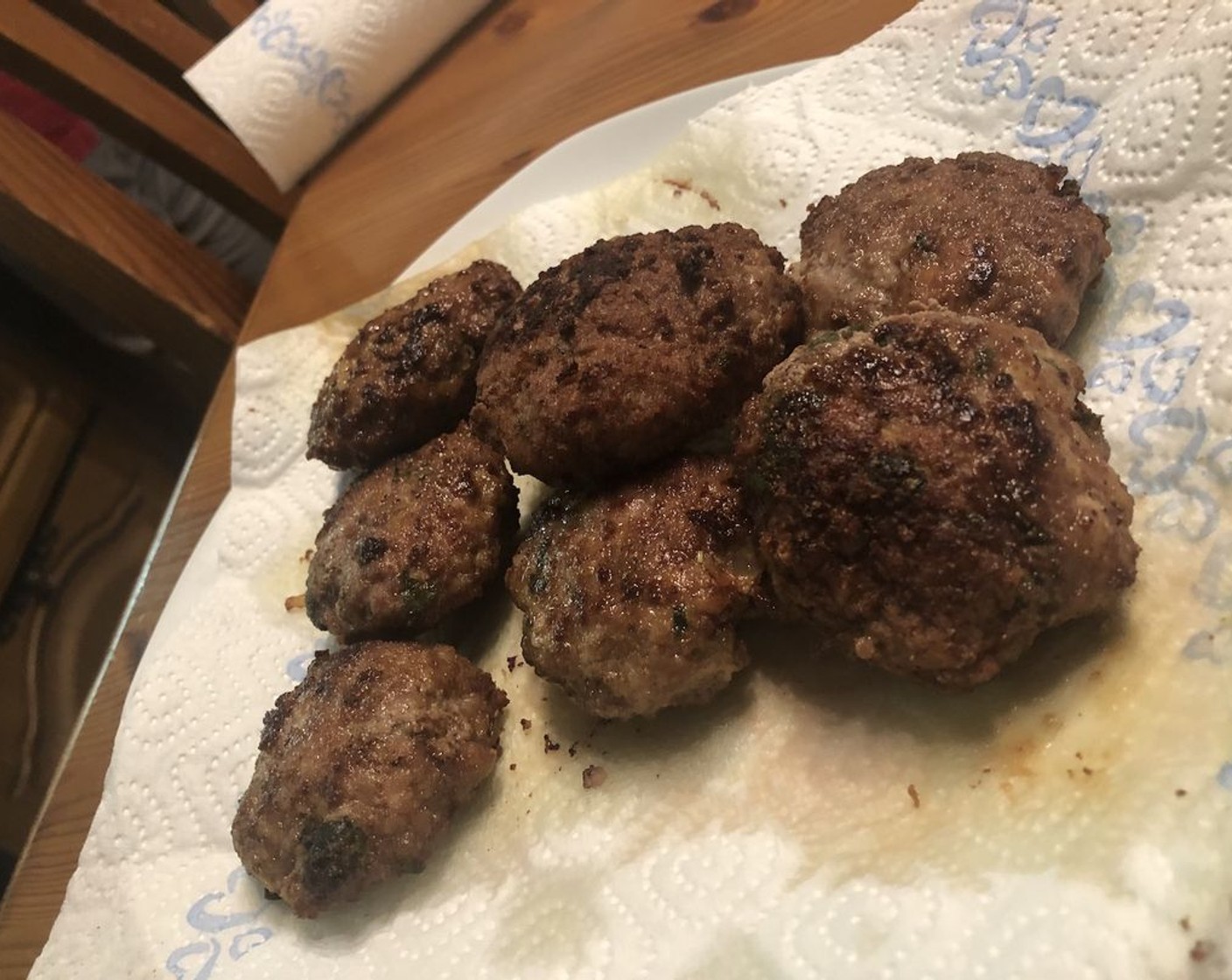 step 19 Transfer cooked patties onto a paper towel to soak up excess oil.