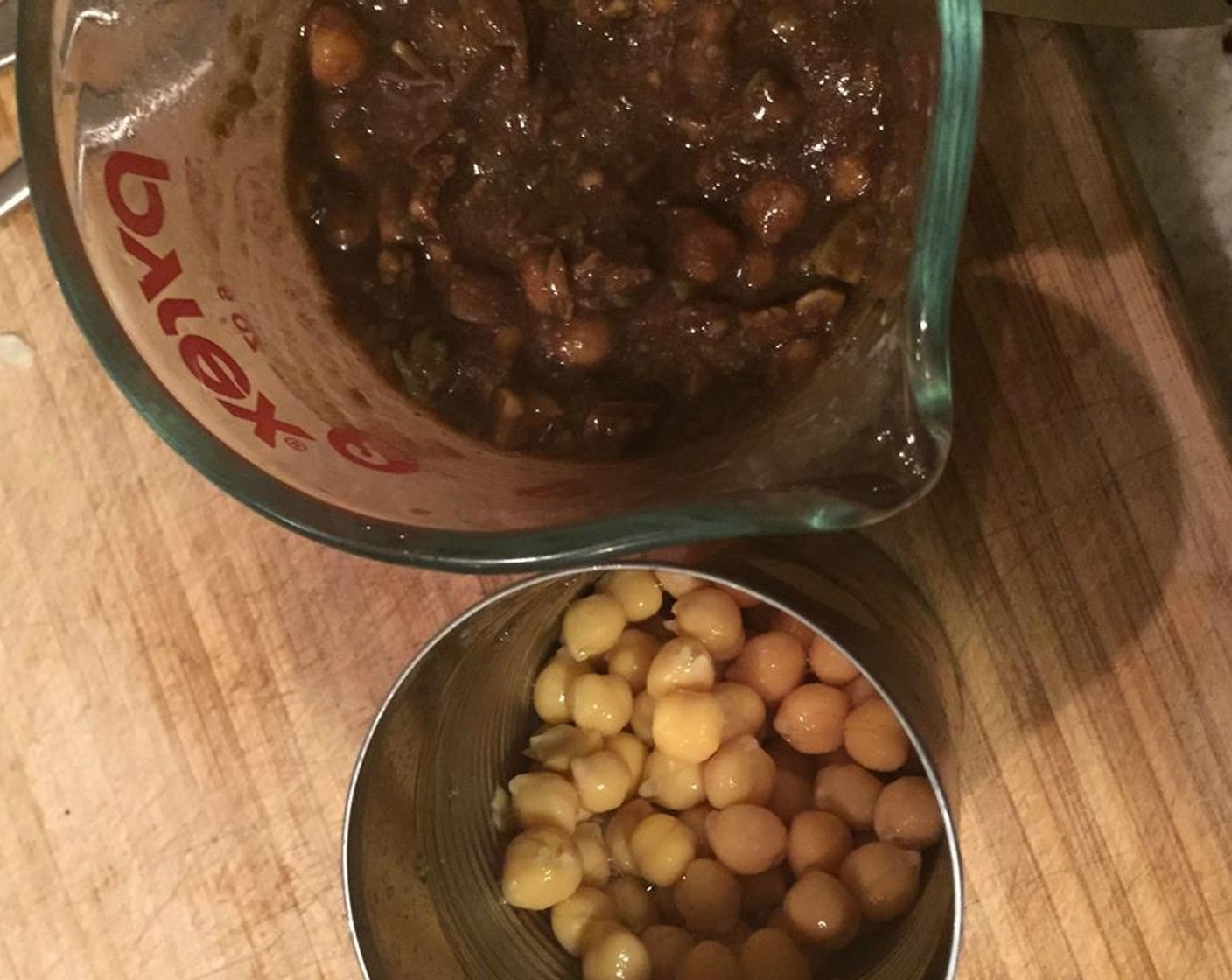 step 3 Add some of the chickpeas and crush them against the side of the bowl.