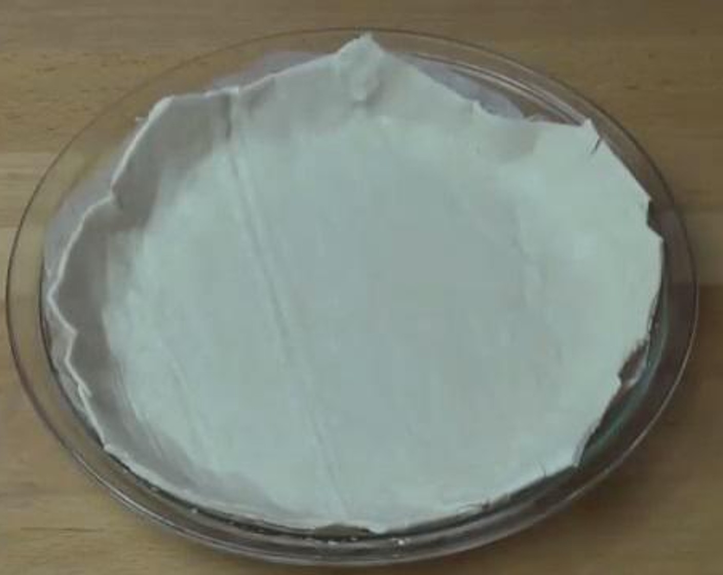 step 2 Sprinkle the Nonstick Cooking Spray (as needed) over a pie dish. Line the dish with nonsticky baling paper. Gently press Puff Pastry (1) into the dish. Cut the edges which are outside of the dish and set them aside while you are working on the filling.