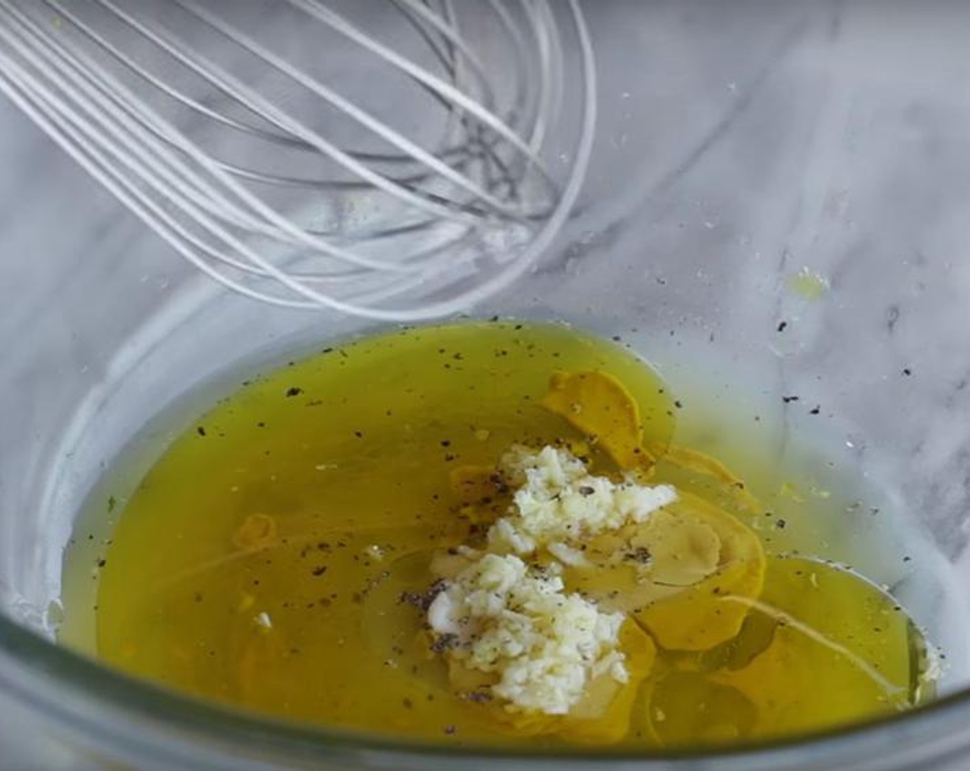 step 2 In a bowl, whisk together Vegetable Stock (2 Tbsp), Extra-Virgin Olive Oil (4 Tbsp), White Wine (2 Tbsp), Garlic (2 cloves), Dijon Mustard (2 Tbsp), Salt (to taste), and Ground Black Pepper (to taste). Add warm potatoes, gently toss to coat; let it sit for ten minutes.