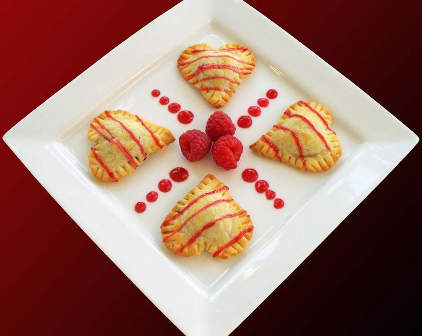 step 9 Arrange chocolate ravioli hearts on a dessert plate and drizzle with raspberries preserves. Add some fresh Fresh Raspberries (15) and serve while the ravioli are warm.
