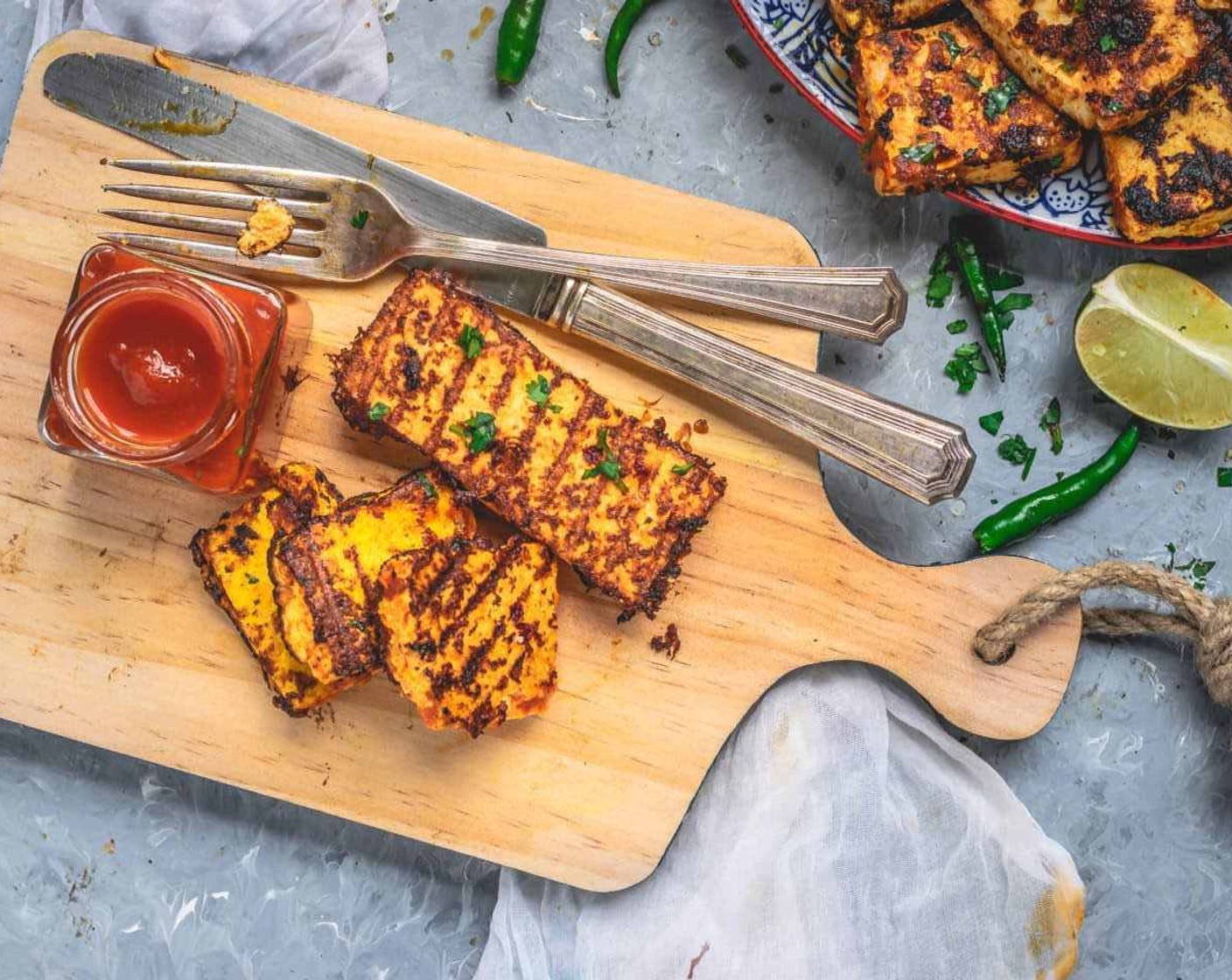 step 12 Grilled Chickpea Tofu Fingers In Homemade Schezwan Sauce is ready. Garnish with Fresh Cilantro (2 Tbsp). Serve it hot along with chutney or ketchup or mayo.