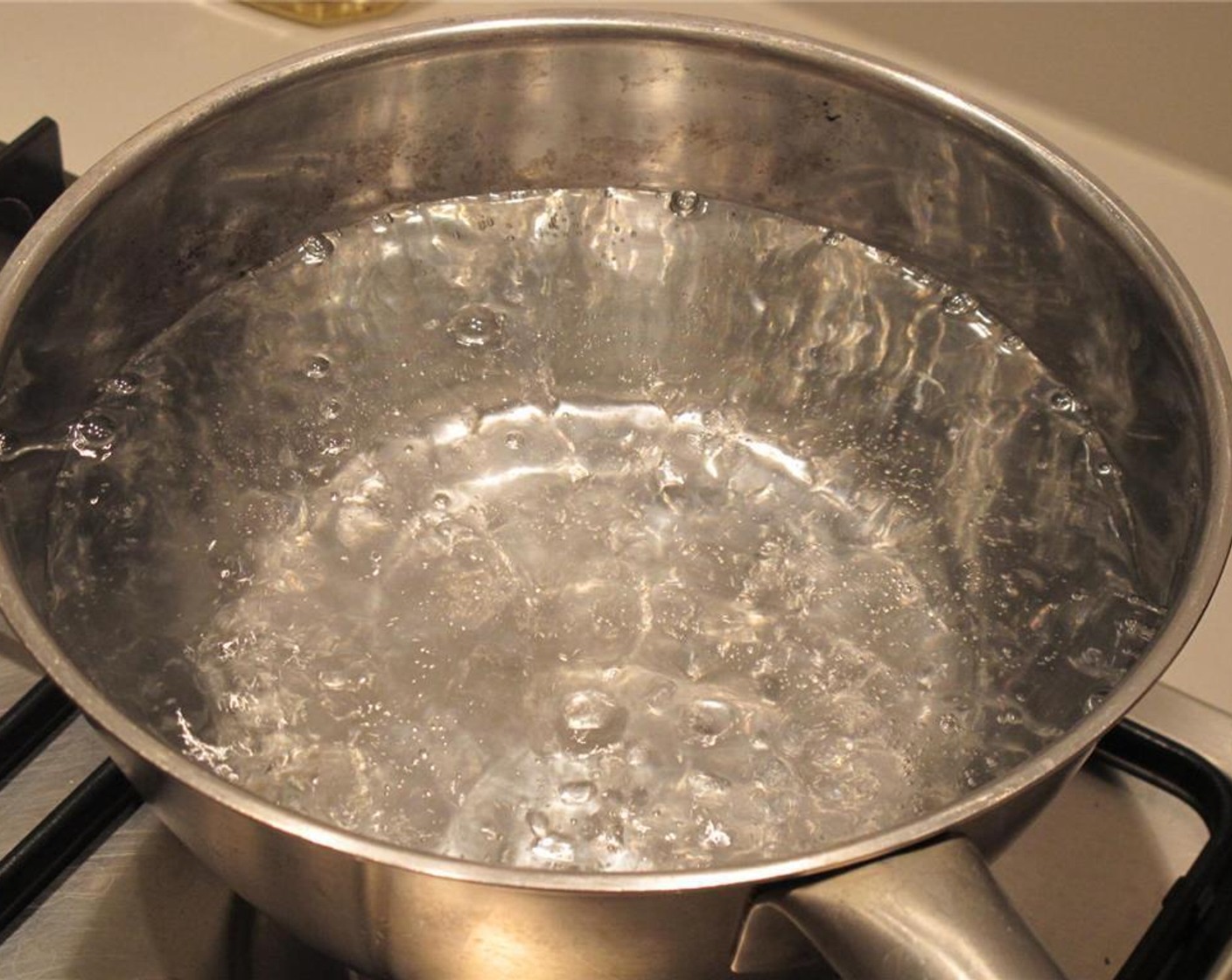 step 1 Bring a large pot of Water (64 fl oz) to boil and then turn off the stove.