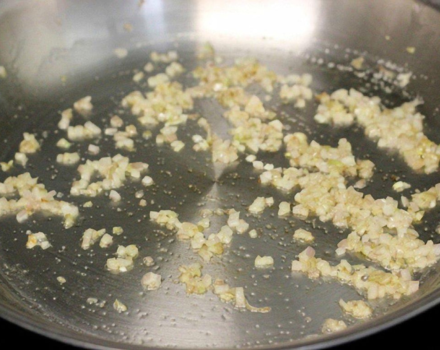 step 7 Mince the Shallot (1). Melt the Butter (1 Tbsp) in a skillet. Add the shallot, season with Salt (to taste) and Ground Black Pepper (to taste). Cook for about 3 minutes.