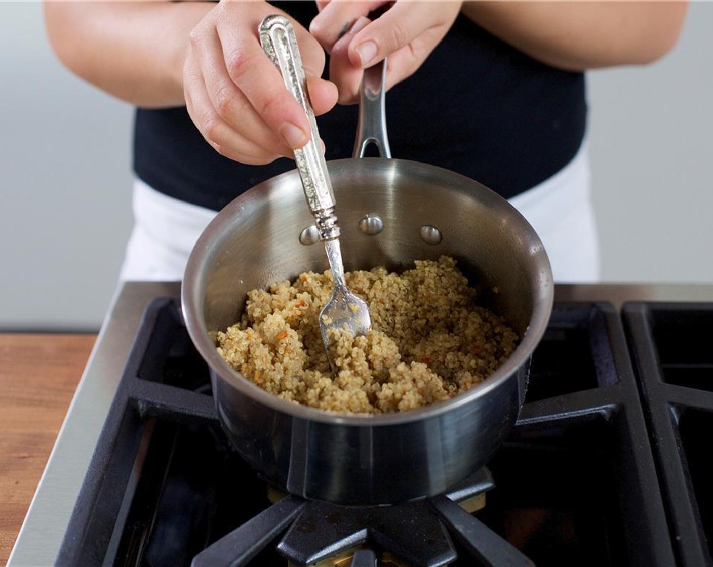 step 1 In a small saucepan over medium high heat, bring one and a half cups of water to a boil. Add Garden Vegetable Quinoa (1 pckg) and return to a boil. Reduce heat to low, cover, and let simmer for 15 minutes. Remove from heat and keep warm.