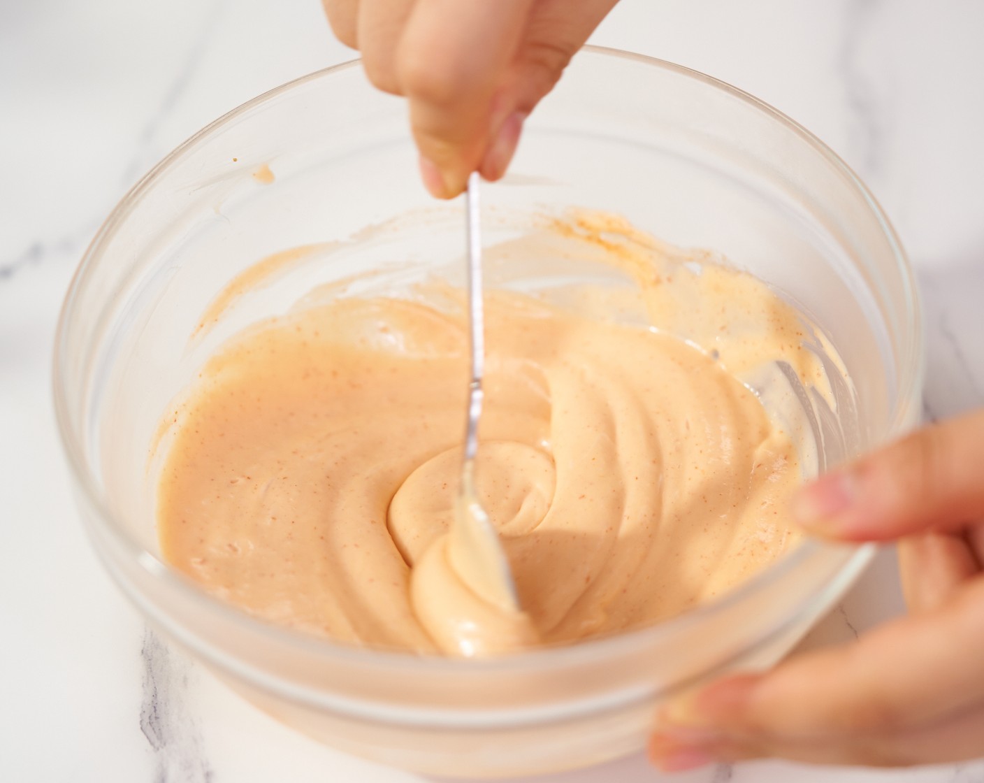 step 4 To make the Spicy Mayonnaise, mix the Mayonnaise (1/2 cup) with Sriracha (2 Tbsp) in a separate bowl. Set aside in the fridge.