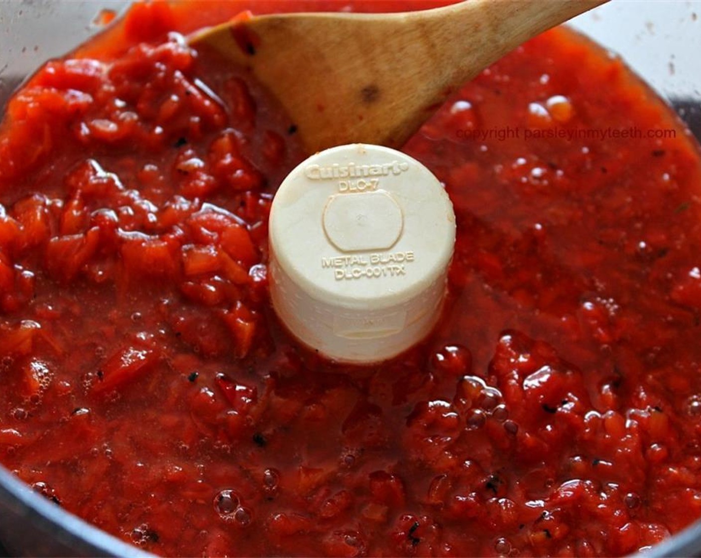 step 3 Place Fire Roasted Red Pepper (1 can), Sun-Dried Tomatoes in Olive Oil (1/2 cup), Water (1 cup) in a food processor, and pulse until well chopped, but not pureed.