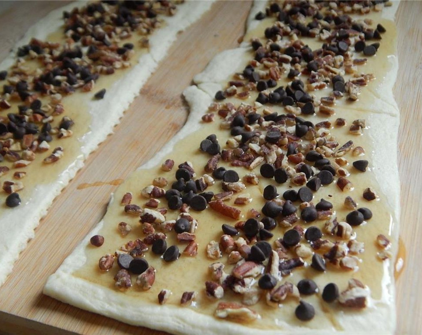 step 4 Sprinkle Chopped Pecans (4 Tbsp) and Mini Chocolate Chips (2 Tbsp) on each piece.