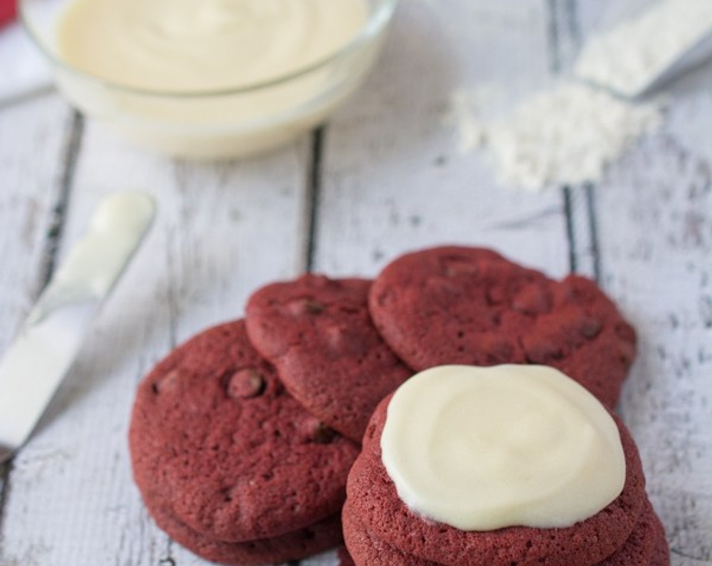 step 12 Use a spatula to spread the frosting onto the cooled cookies. Enjoy!