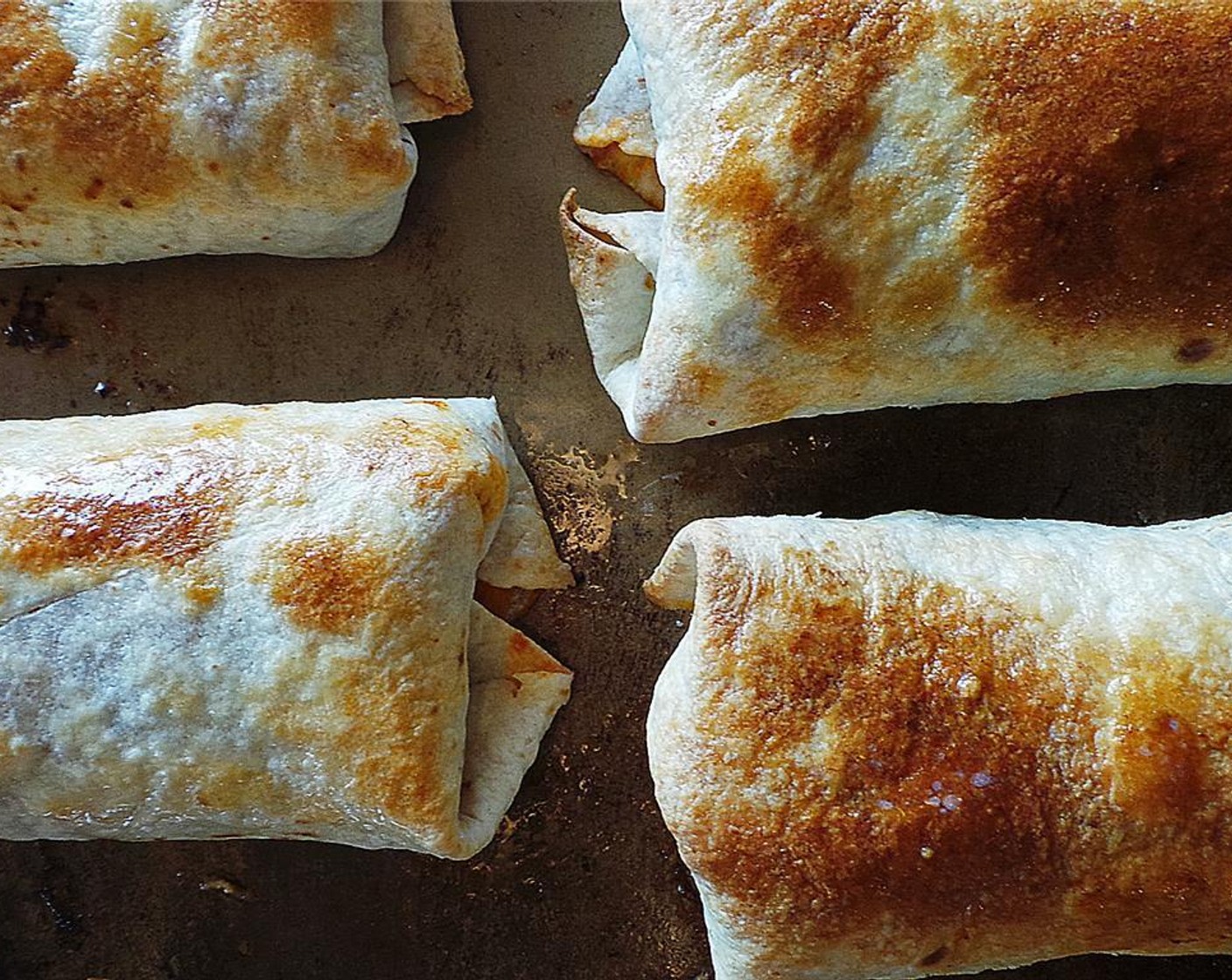 step 6 Melt the Butter (1 Tbsp) and brush the outside of the chimichangas with the butter. Bake 10-12 minutes, or until crispy.