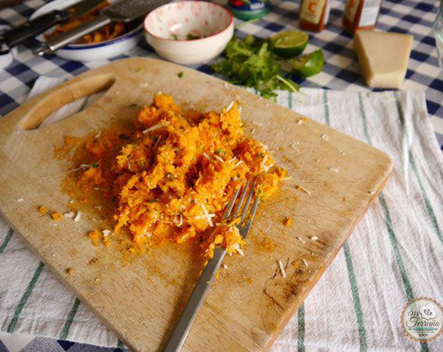 step 4 Once mashed add the Fresh Cilantro (3 Tbsp), Parmigiano-Reggiano (4 Tbsp), Salt (1/2 tsp), Cayenne Pepper (1/4 tsp), Smoked Paprika (1/2 tsp), and Lime (1/2).