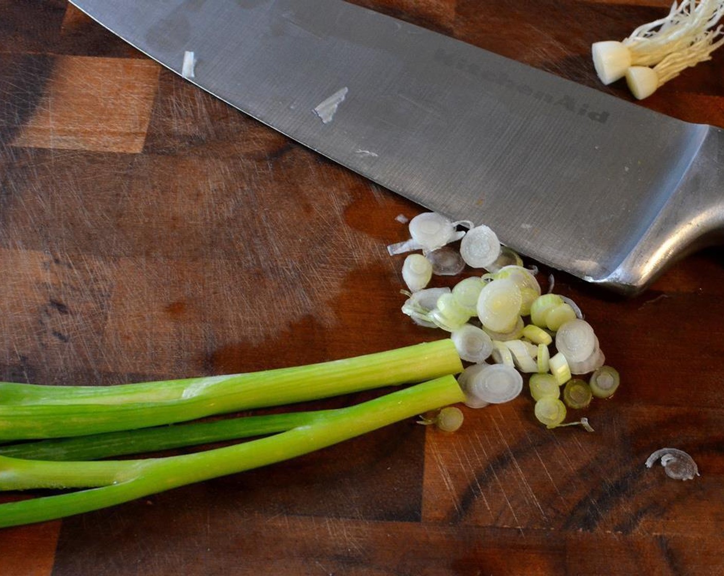 step 1 Finely mince the Garlic (3 cloves), Fresh Ginger (1/2 Tbsp), Lemongrass (2 stalks), Red Bell Pepper (1/4) and Scallion (1 bunch) and set aside.