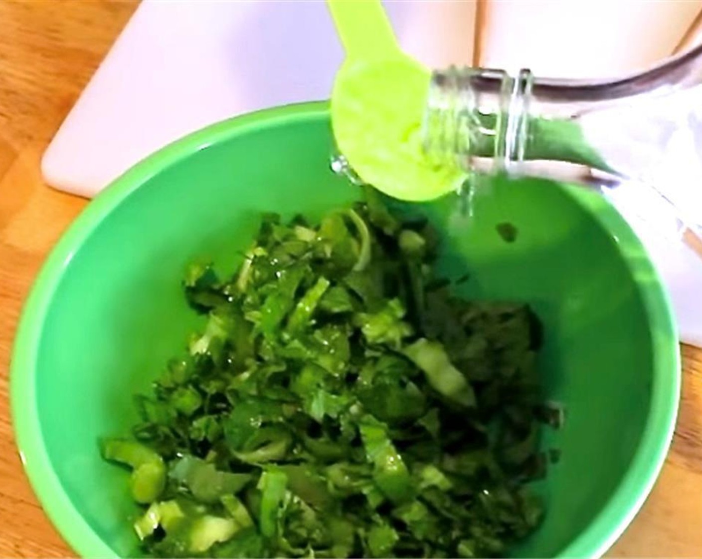 step 1 Shred the Fresh Ginger (1 tsp). Wash and dry the Shen Li Hon (7 1/2 cups), then finely chop it. Place in a bowl and combine with Salt (1/2 tsp) and Rice Wine (1 tsp). Smash with your hands to soften. Then let sit 30 minutes. Rinse and squeeze dry.