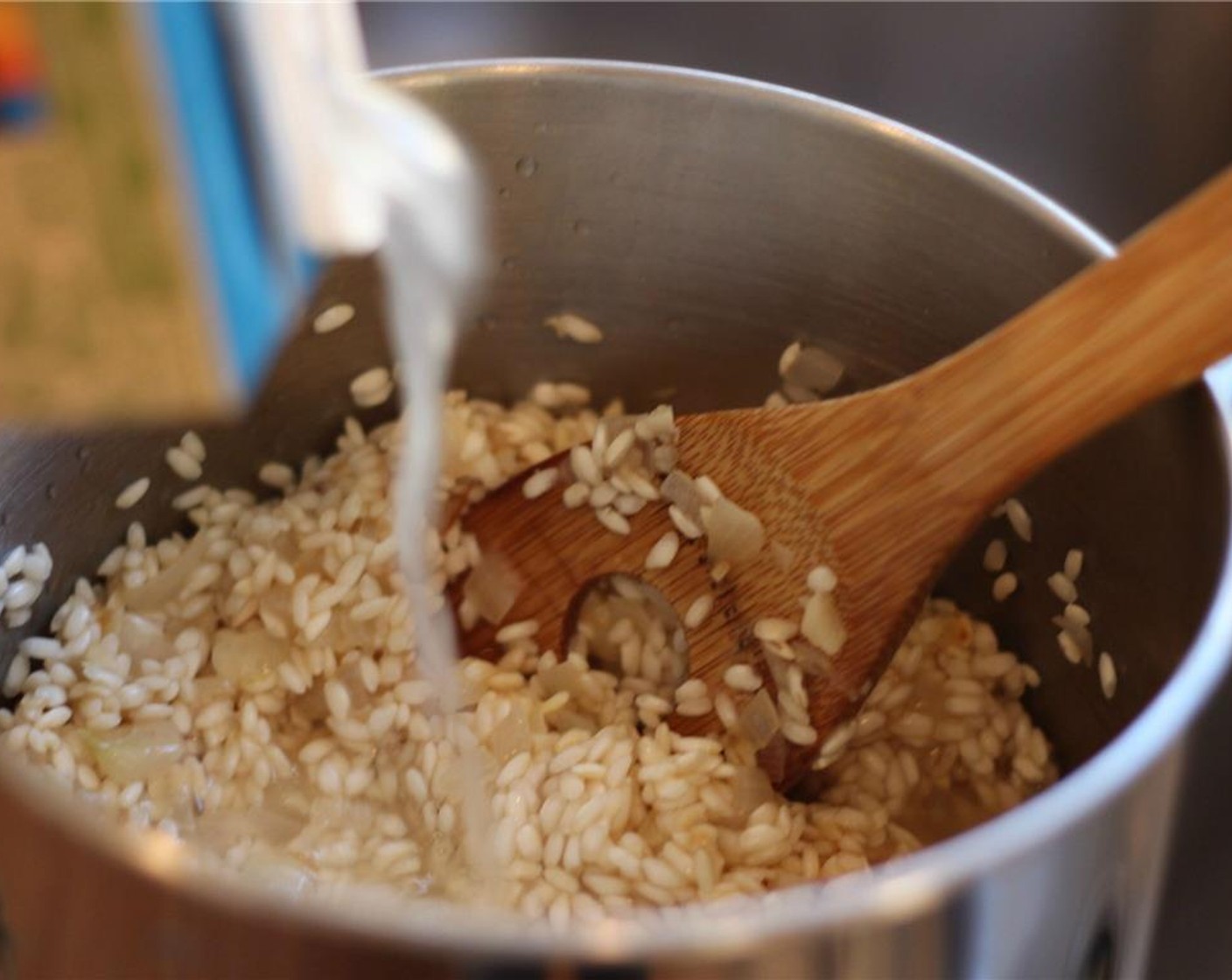 step 6 Add in 1/2 cup of Chicken Stock (5 cups) and stir until reduced. Continue repeating this step until all the stock is gone, and rice becomes thick, soft, and creamy.