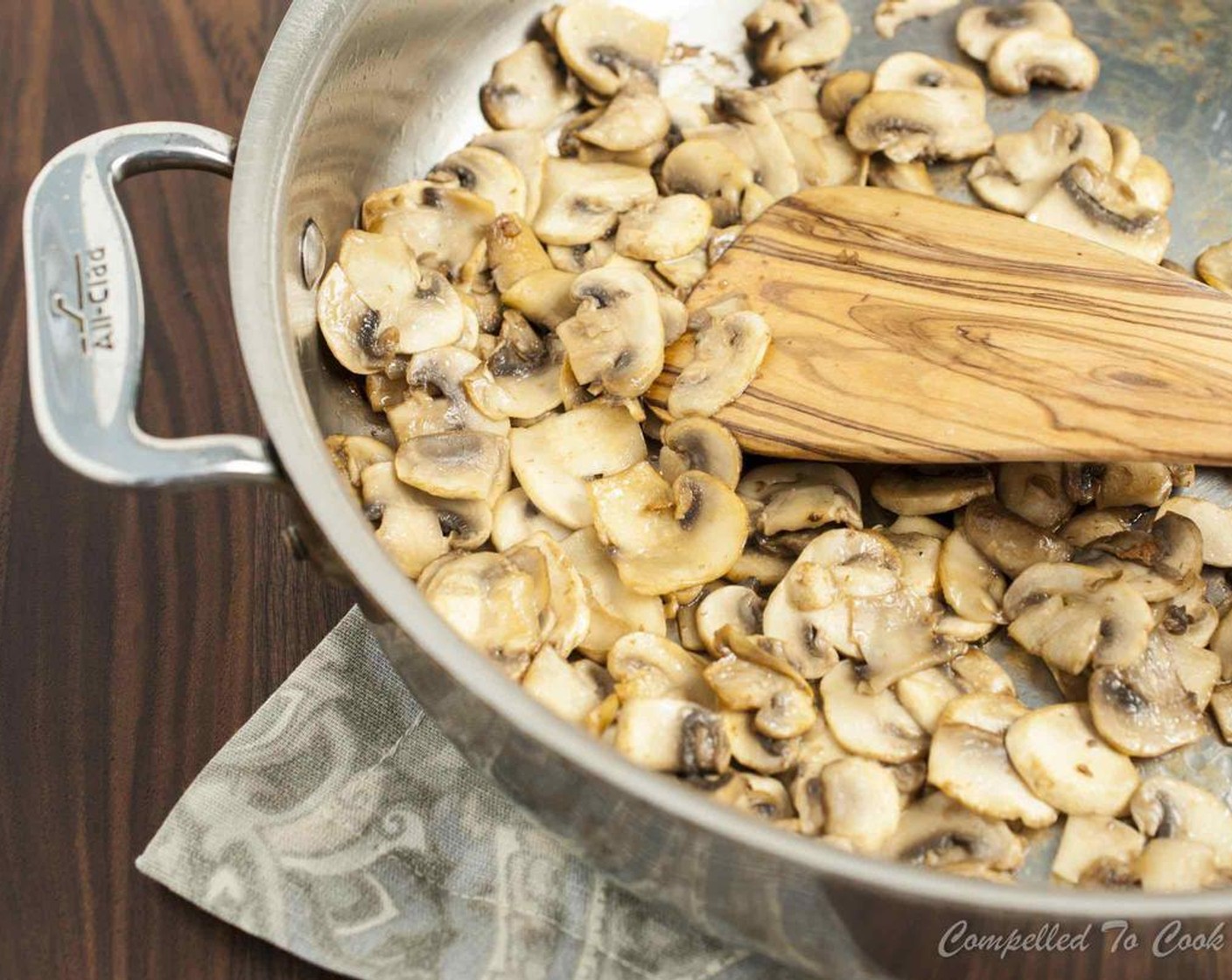 step 2 Using the same skillet, increase heat to medium-high and add 1 tablespoon of bacon fat. Add the sliced Mushrooms (2 1/4 cups) and cook until starting to brown and moisture has evaporated, about 8 minutes. Remove from pan and set aside.