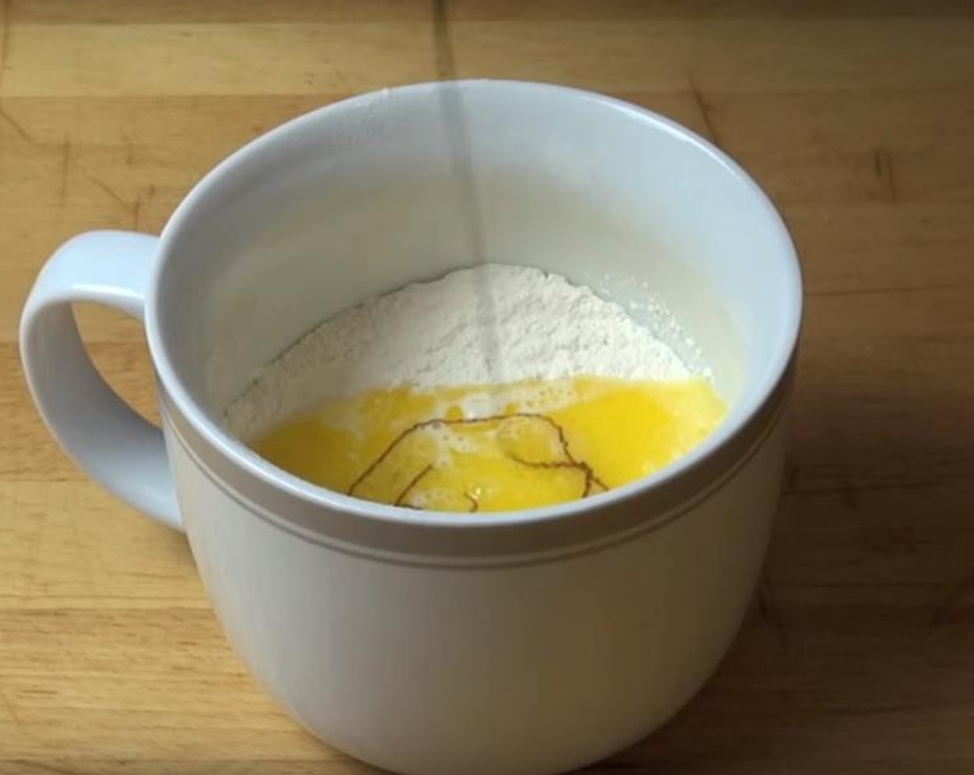 step 1 Put All-Purpose Flour (1/3 cup), Granulated Sugar (2 Tbsp), Baking Powder (1/4 tsp), and Salt (1 pinch) into a large coffee mug. Mix them until they are combined.