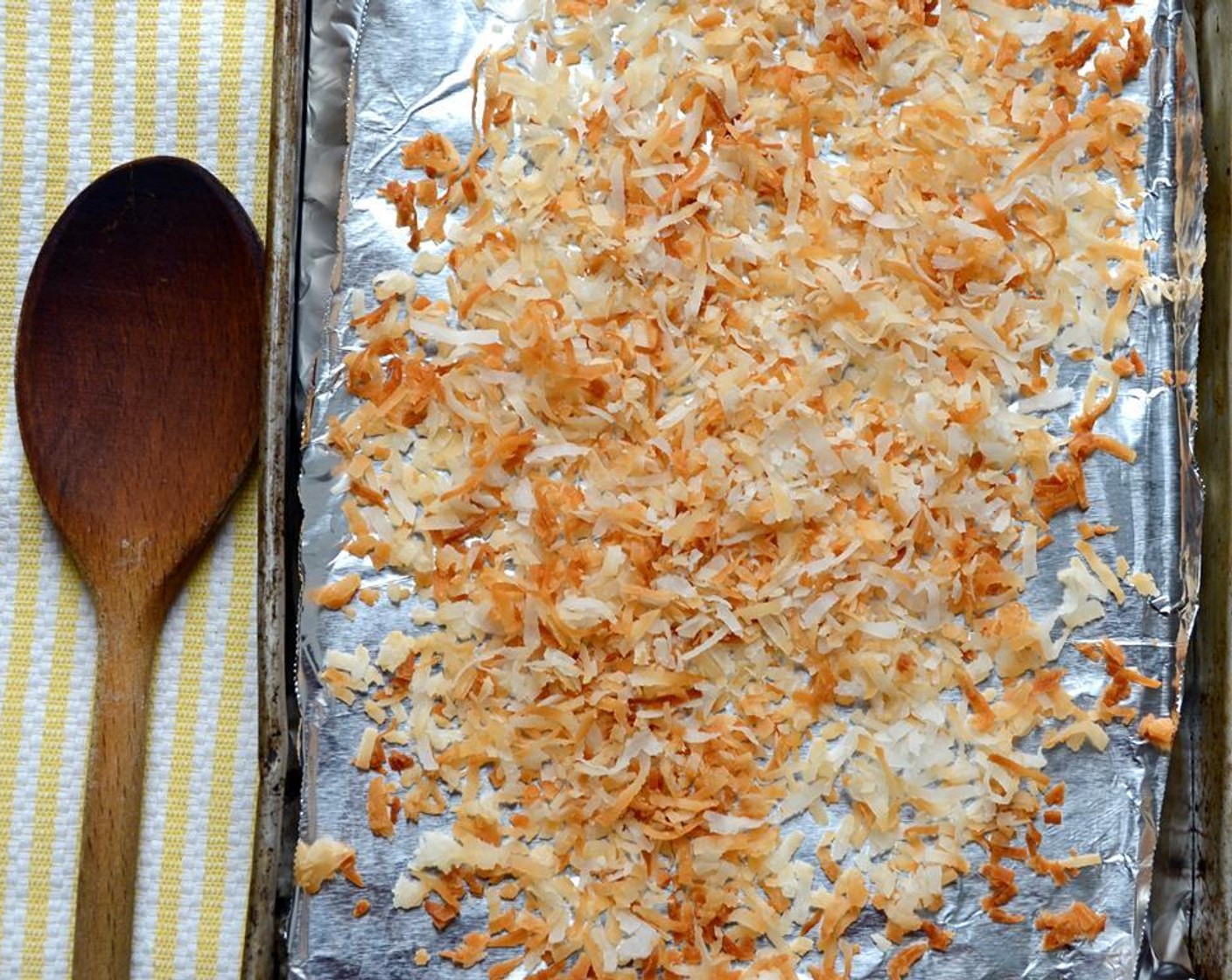 step 12 Place the Sweetened Coconut Flakes (1/2 cup) onto a baking sheet in a single layer. Bake for 6 to 10 minutes until coconut is lightly browned. Remove from oven and set aside.