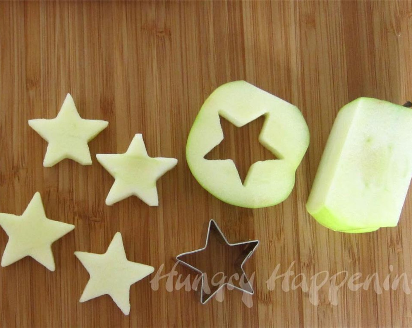 step 7 Slice a thin piece off each side of the Granny Smith Apple (1). Then make 4 thicker slices from each side. Cut 4 stars from the slices. Dip or brush stars in Lime (1/4) keep apples from browning.