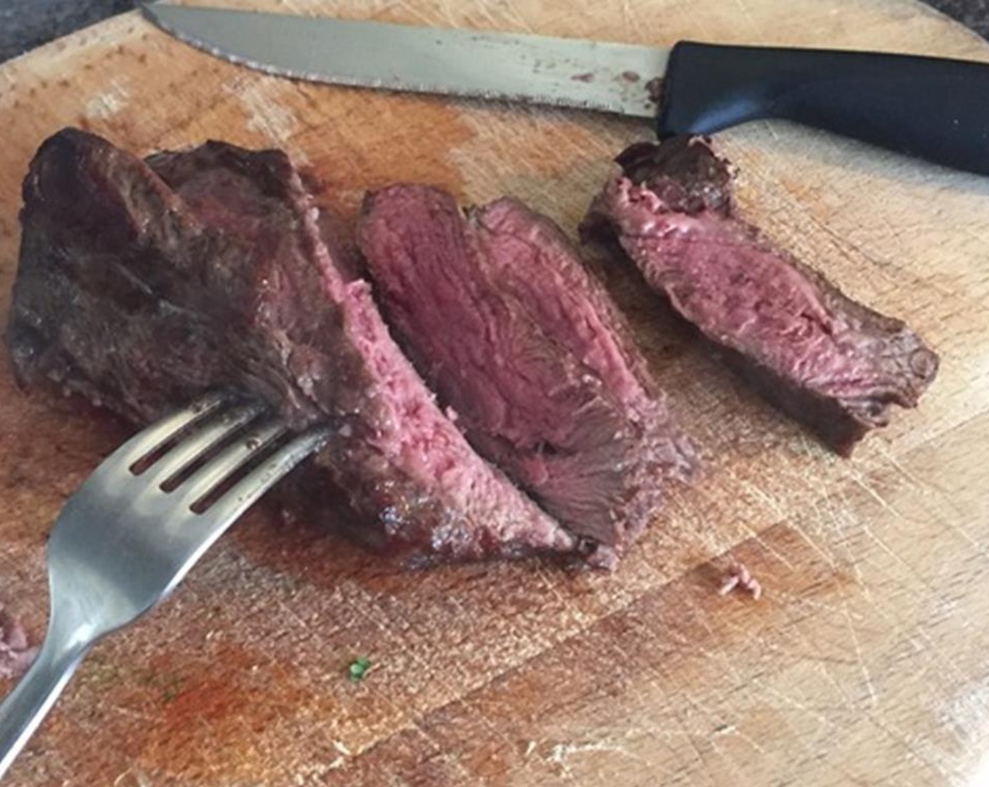 step 5 Let the steak rest for 4 or 5 minutes, then slice crossways into thin slices.