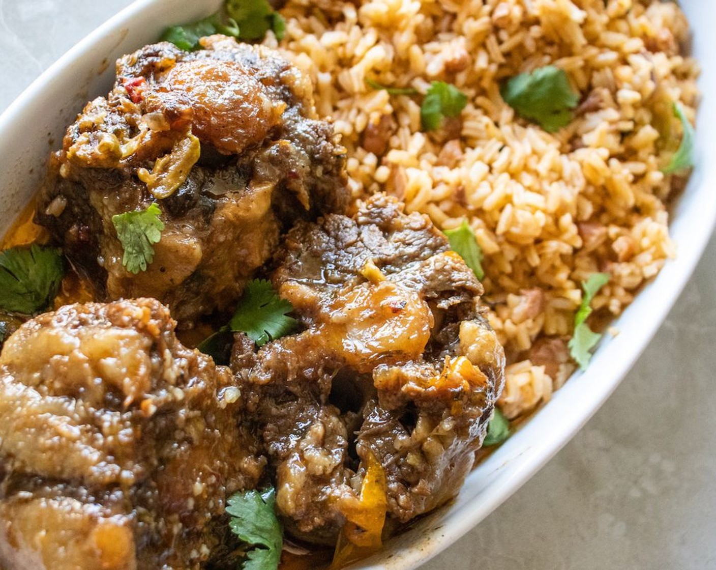 step 7 After 25-30 minutes, uncover rice and stir. Cover again for 5 minutes. Uncover, stir and it is ready to serve with the oxtail.